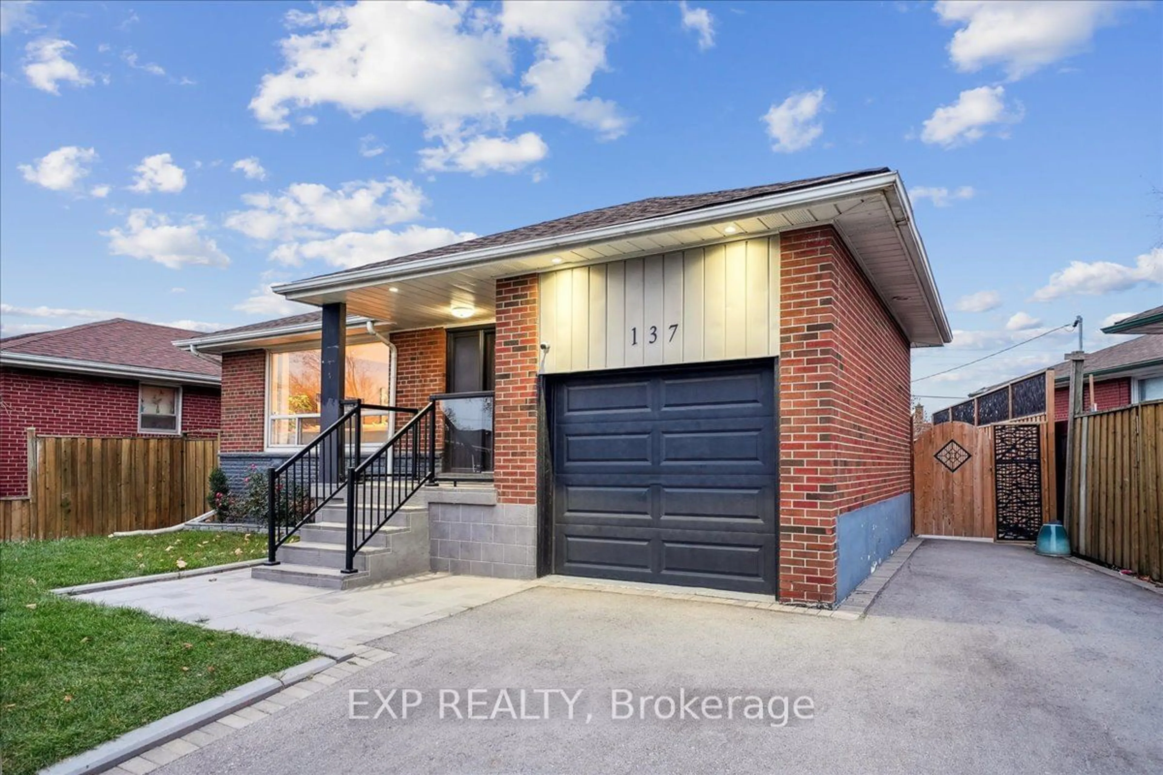 Home with brick exterior material for 137 Kingsview Blvd, Toronto Ontario M9R 1V7