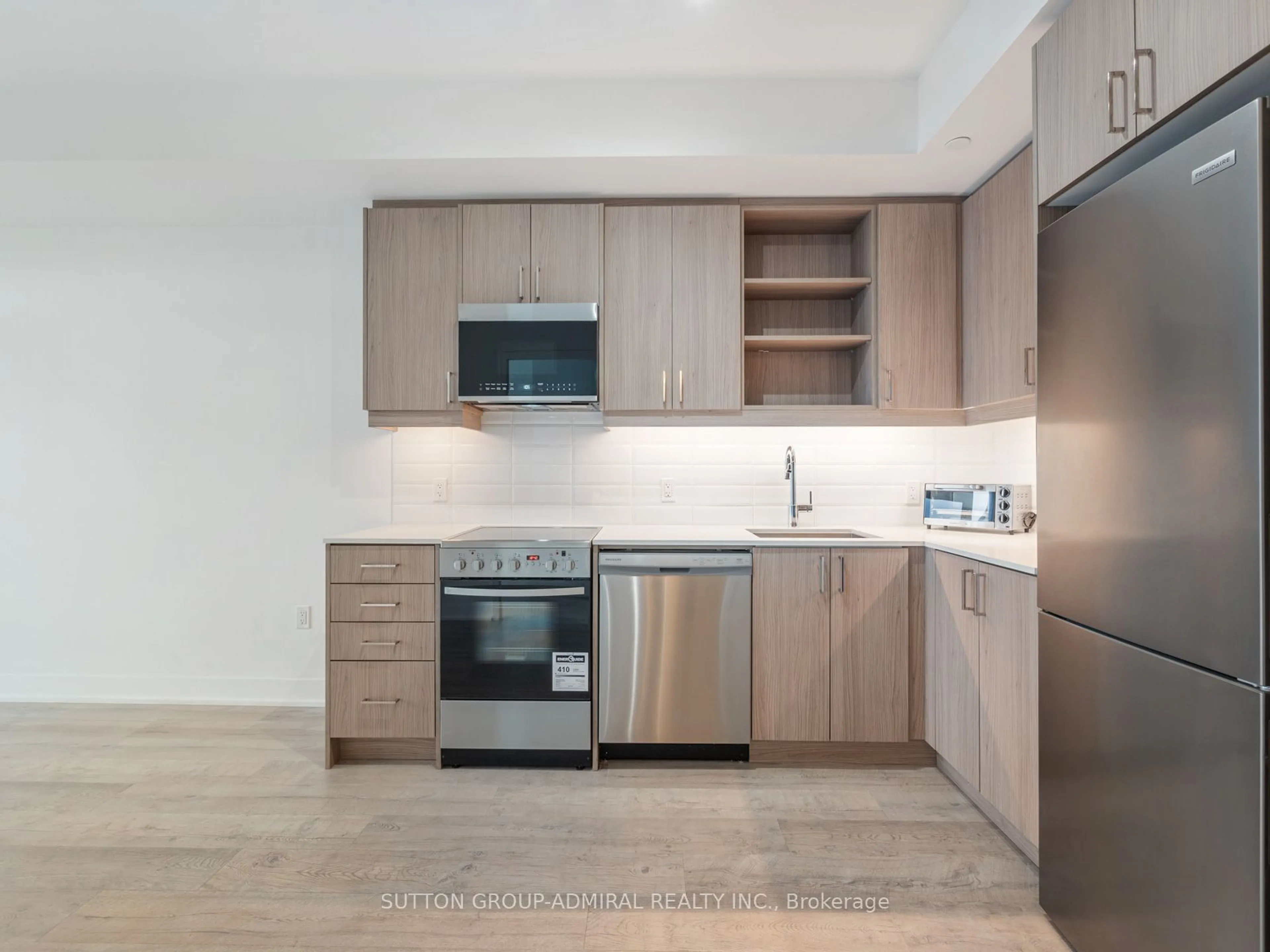 Standard kitchen, wood floors for 50 George Butchart Dr #817, Toronto Ontario M3K 0C9