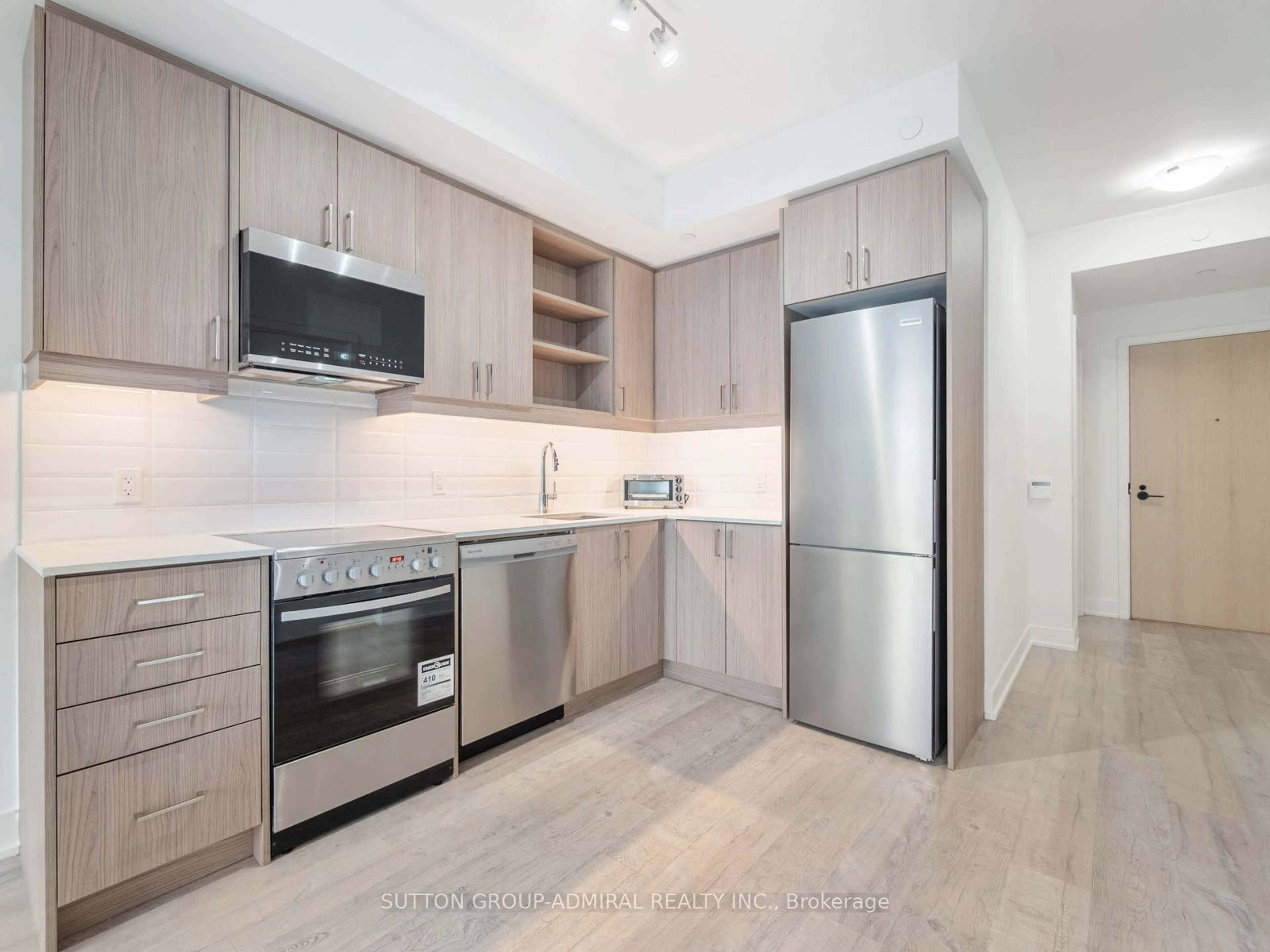 Standard kitchen, wood floors for 50 George Butchart Dr #817, Toronto Ontario M3K 0C9