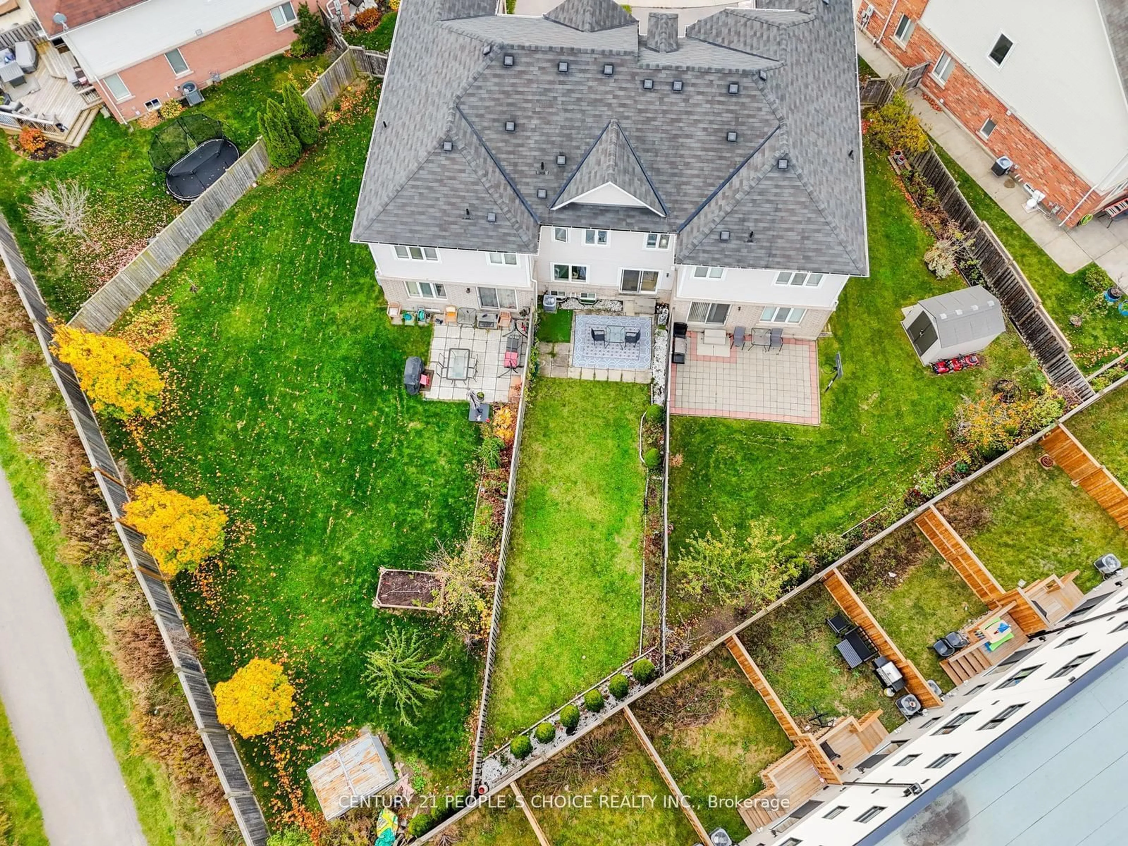 Frontside or backside of a home, the fenced backyard for 4872 Capri Cres, Burlington Ontario L7M 0H8