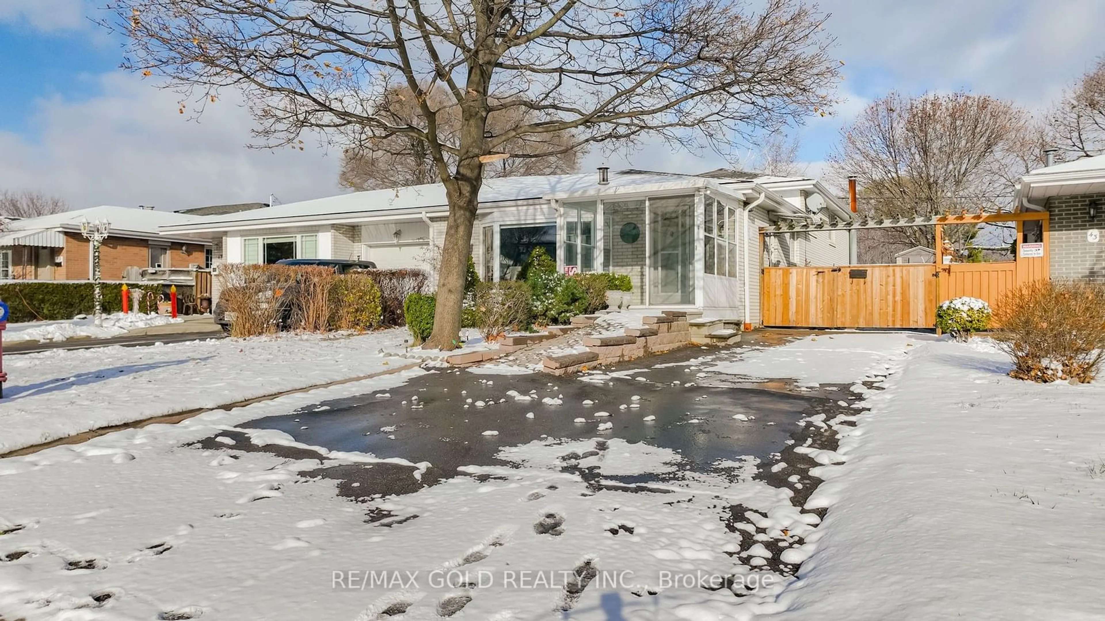 A pic from exterior of the house or condo, the fenced backyard for 45 Darlington Cres, Brampton Ontario L6T 2Z1