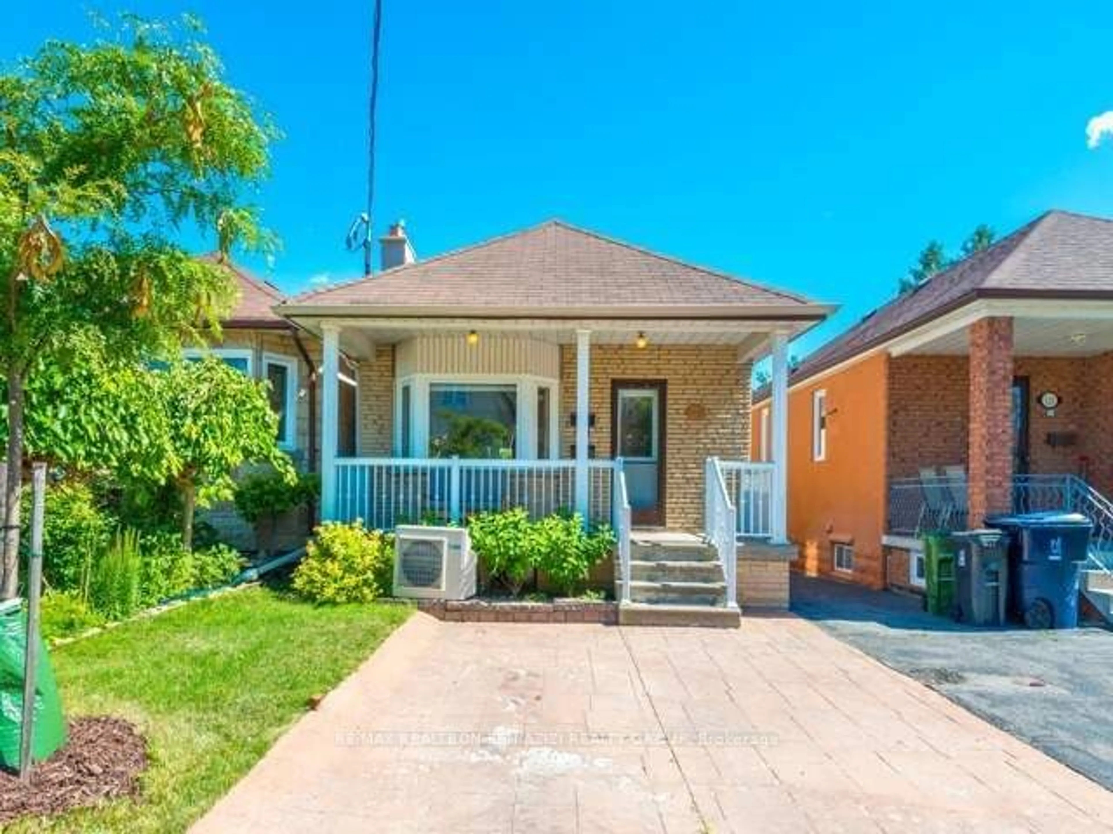 Frontside or backside of a home, cottage for 119 Belgravia Ave, Toronto Ontario M6E 2M4