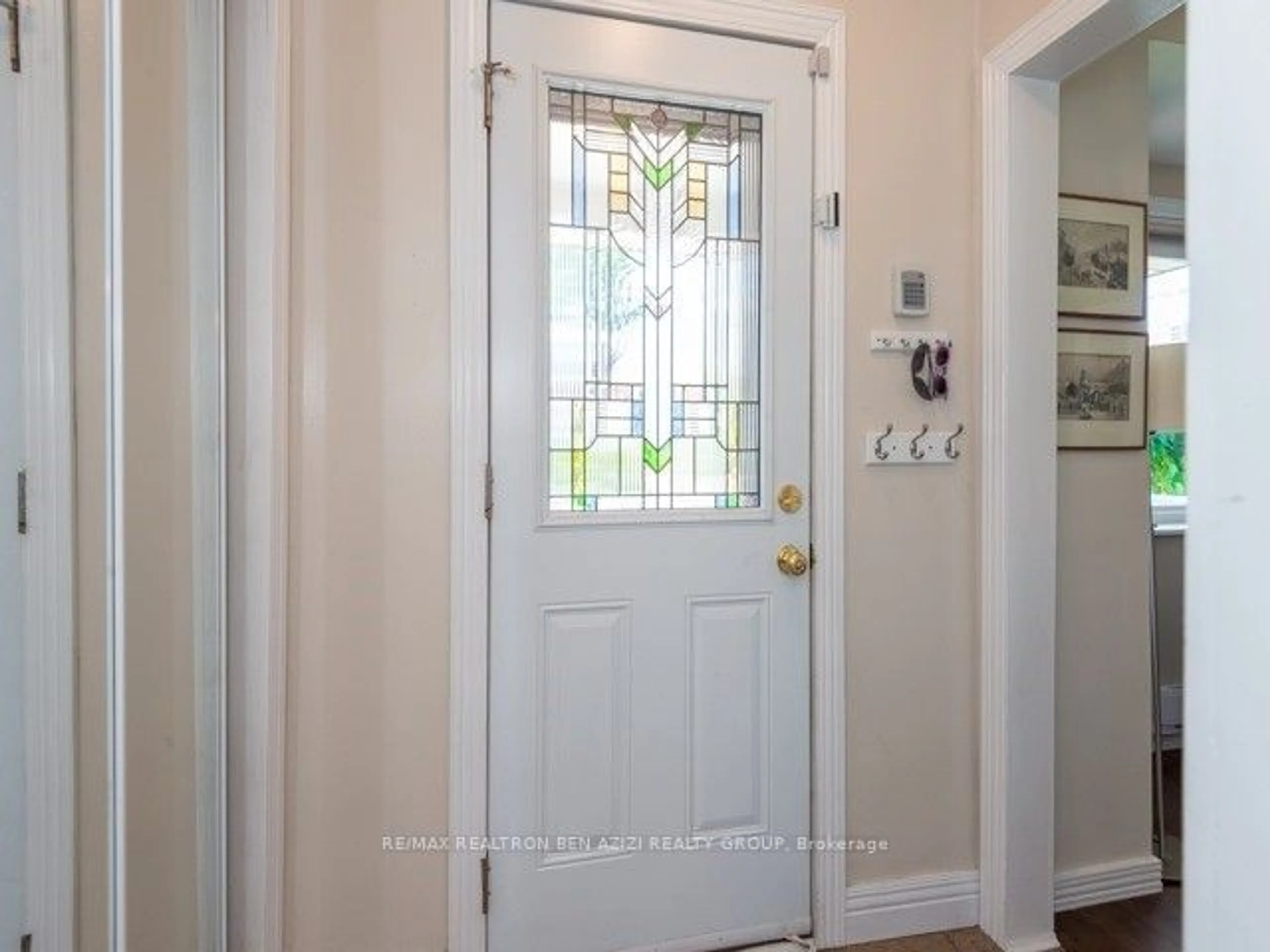 Indoor entryway, wood floors for 119 Belgravia Ave, Toronto Ontario M6E 2M4