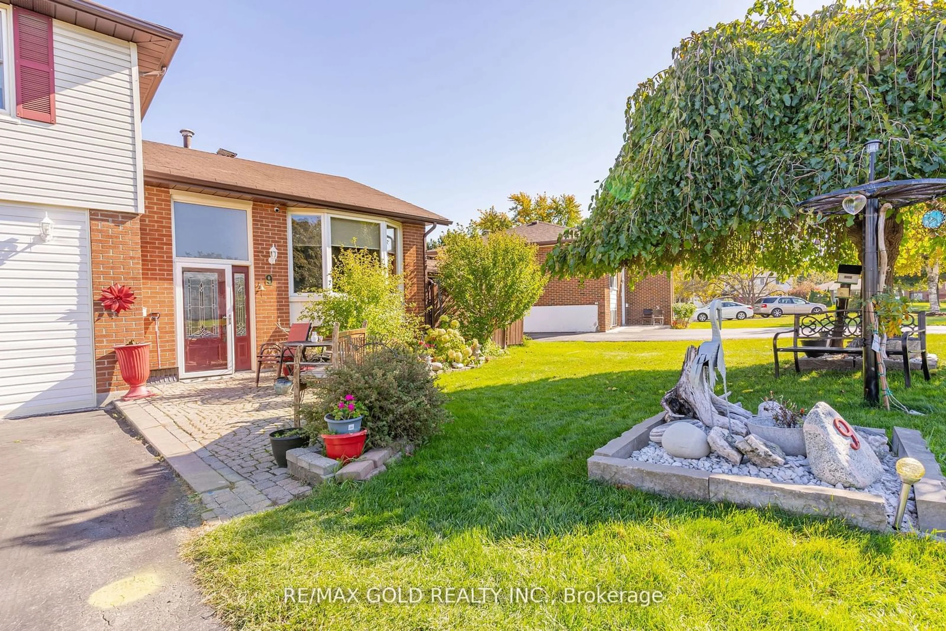 Frontside or backside of a home, the fenced backyard for 9 Dunster Cres, Brampton Ontario L6T 3J8