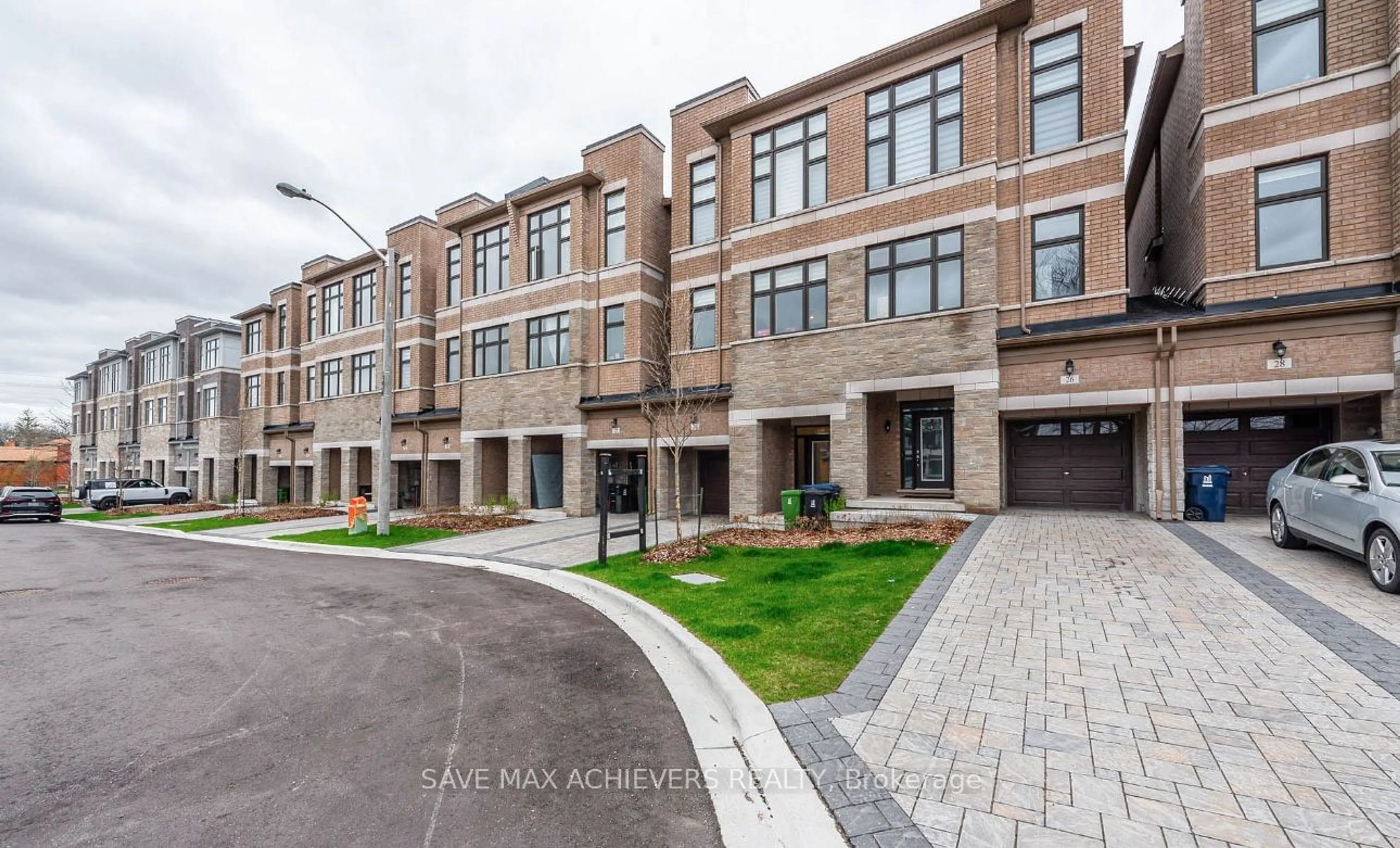 A pic from exterior of the house or condo, the street view for 24 Tarmola Park Crt, Toronto Ontario M9L 0A6