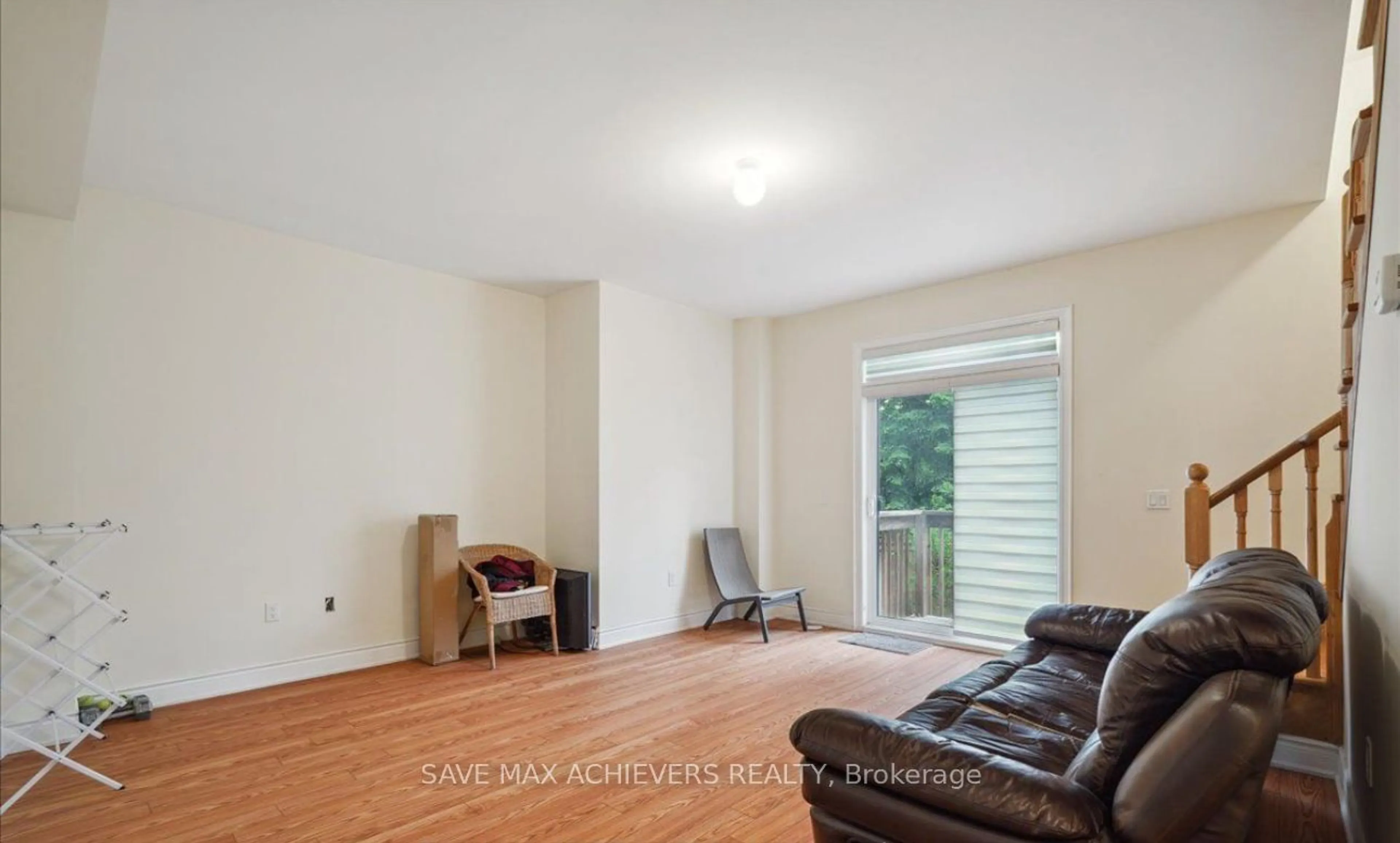 Living room, wood floors for 24 Tarmola Park Crt, Toronto Ontario M9L 0A6