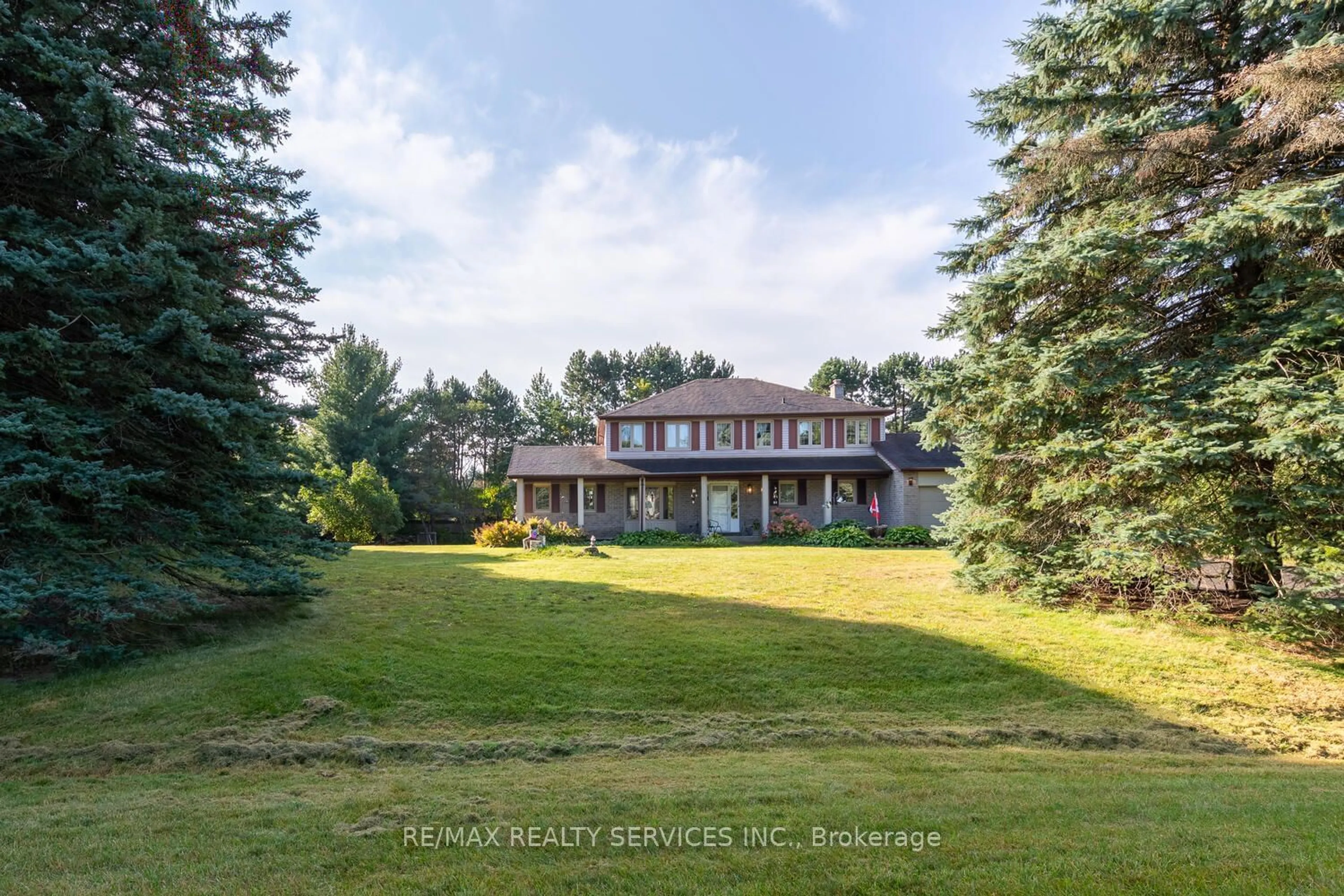 Frontside or backside of a home, the fenced backyard for 1 McCort Dr, Caledon Ontario L7K 0Z4