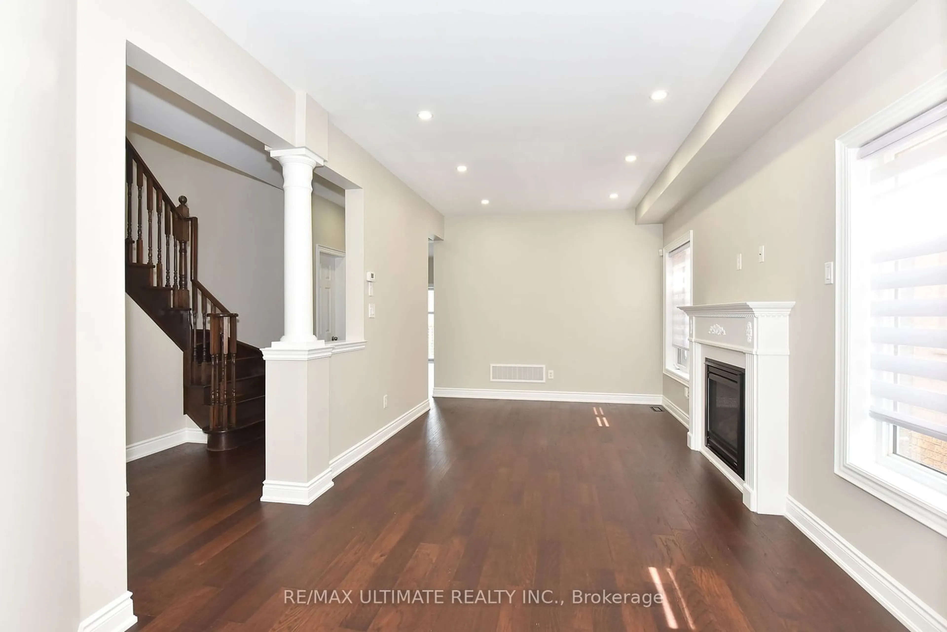 A pic of a room, wood floors for 27 La Roche Ave, Halton Hills Ontario L7G 0B3