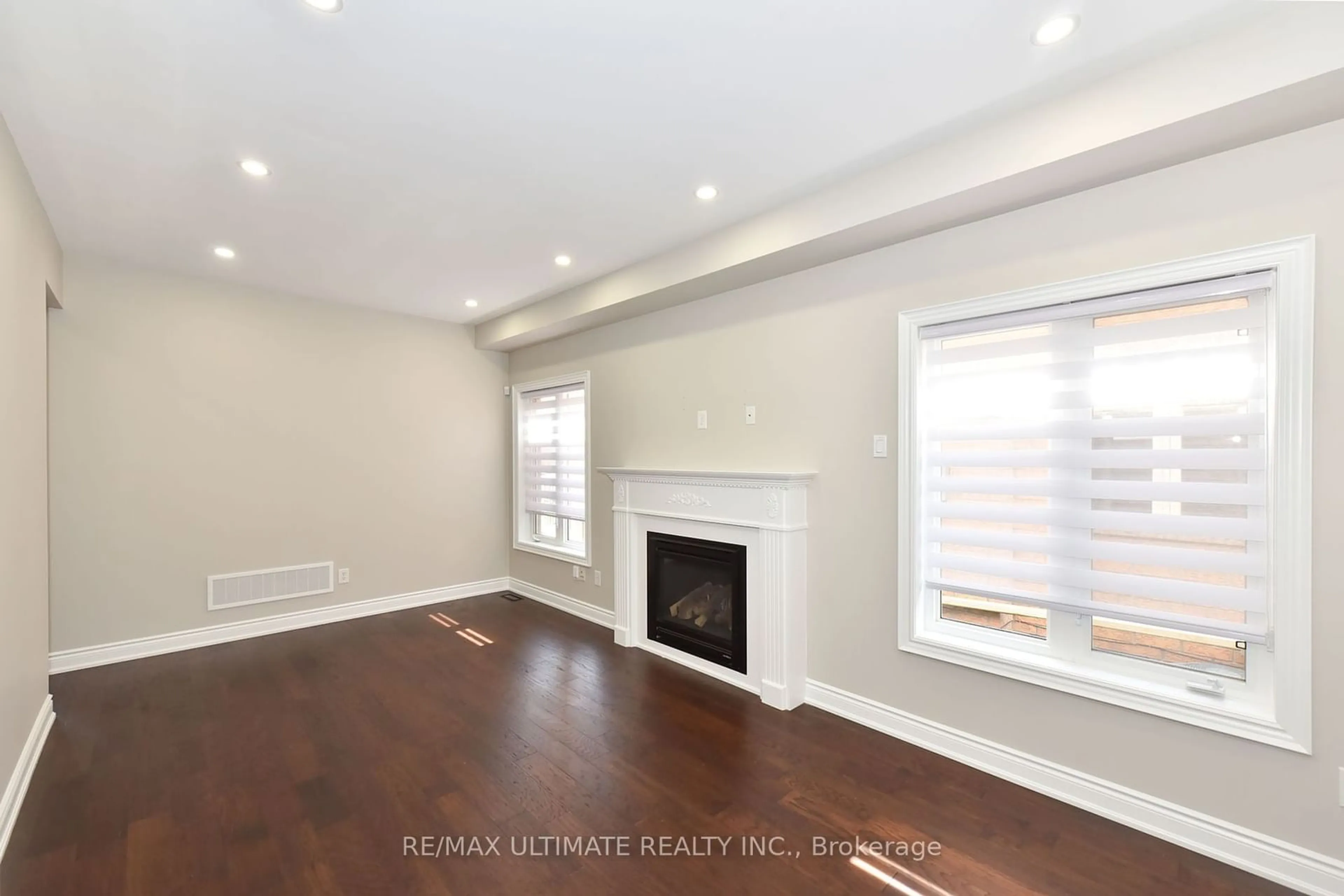 A pic of a room, wood floors for 27 La Roche Ave, Halton Hills Ontario L7G 0B3