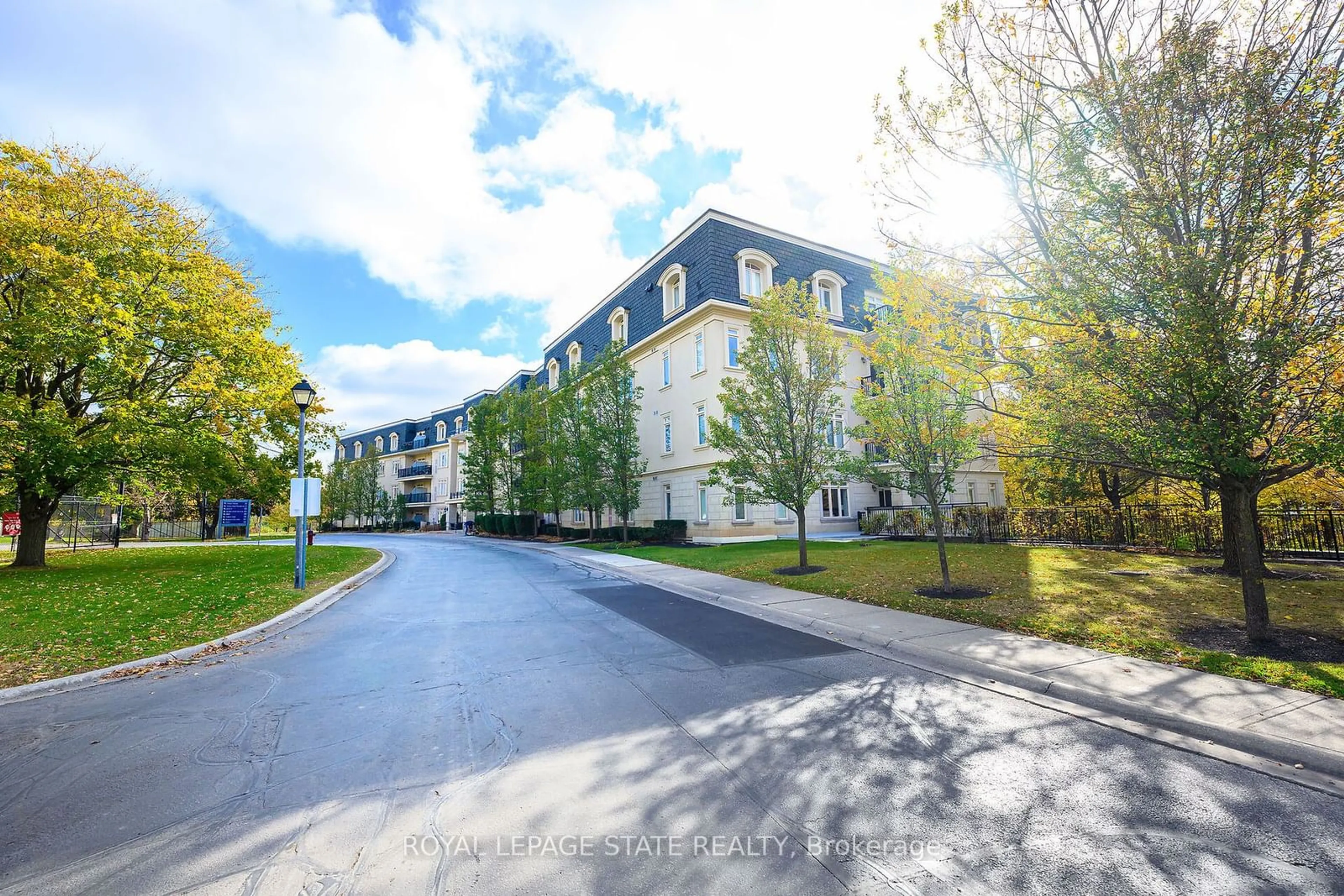 A pic from exterior of the house or condo, the street view for 443 Centennial Forest Dr #213, Milton Ontario L9Y 6A1