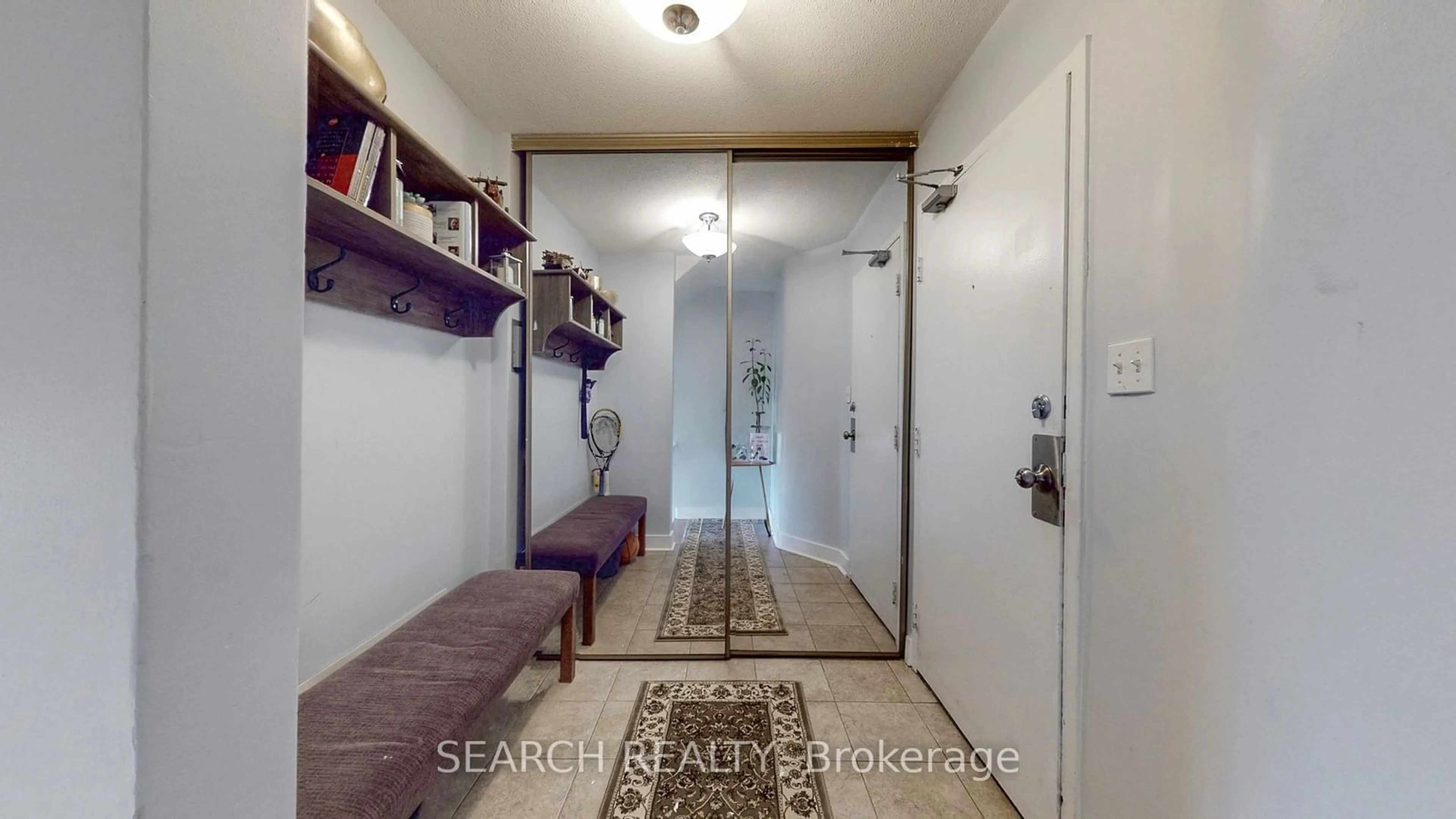 Indoor entryway, wood floors for 11 Wincott Dr #1912, Toronto Ontario M9R 2R9