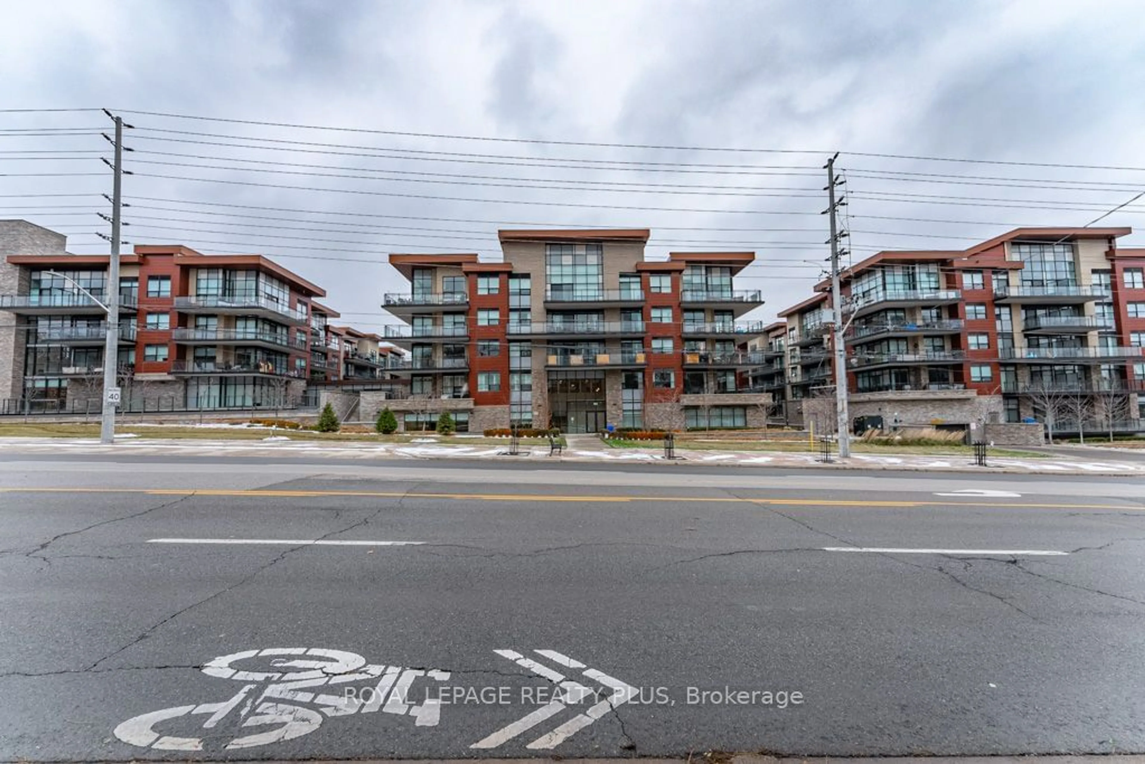 A pic from exterior of the house or condo, the street view for 1575 Lakeshore Rd #465, Mississauga Ontario L5J 0B1