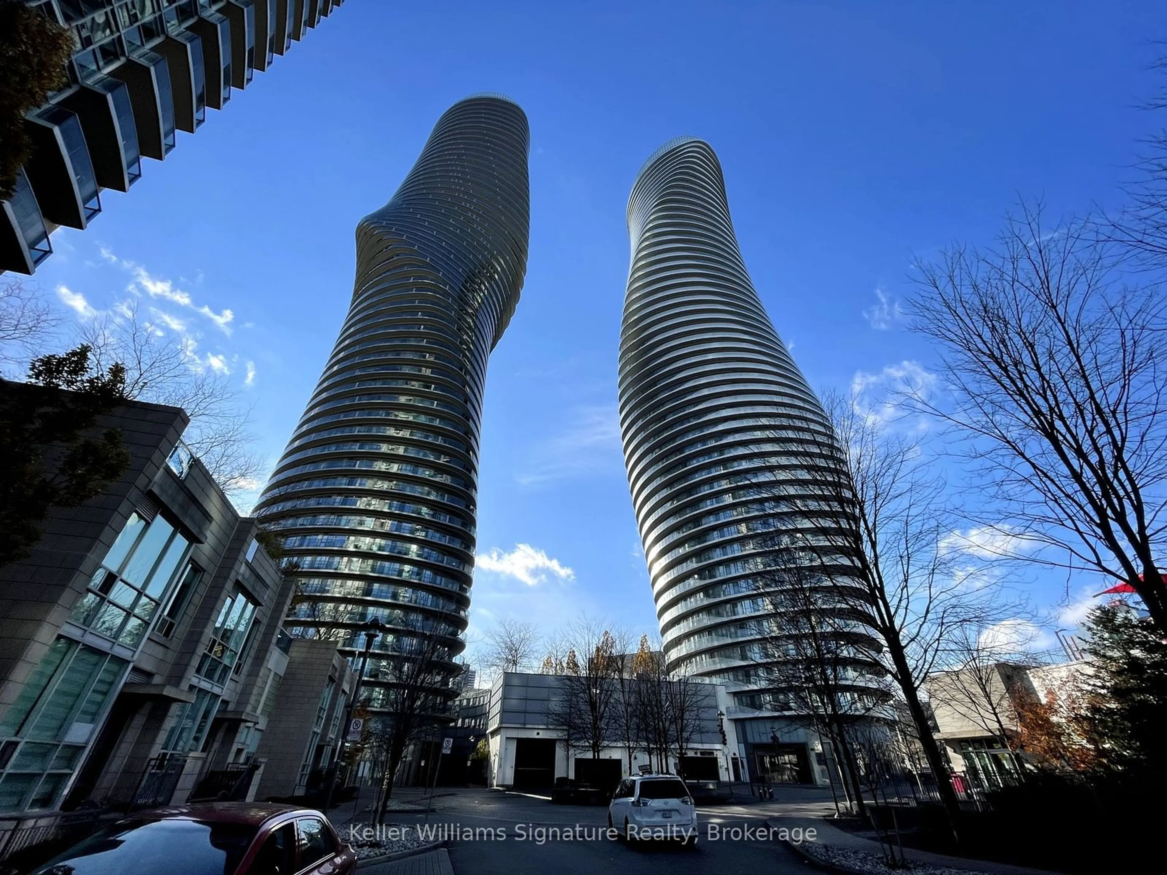 A pic from exterior of the house or condo, the view of city buildings for 60 Absolute Ave #601, Mississauga Ontario L4Z 0A9