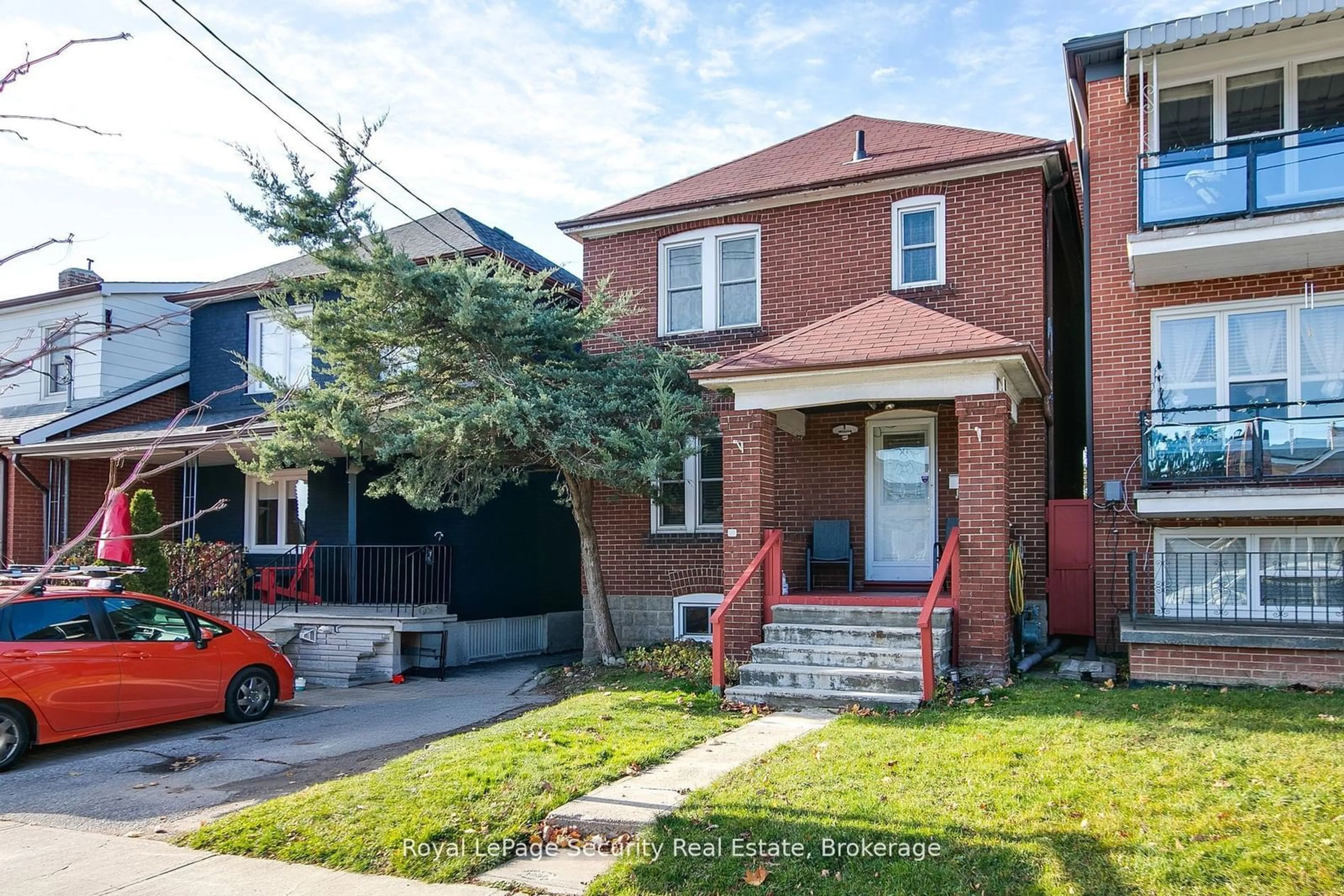 Home with brick exterior material for 94 Fairbank Ave, Toronto Ontario M6E 3Y7