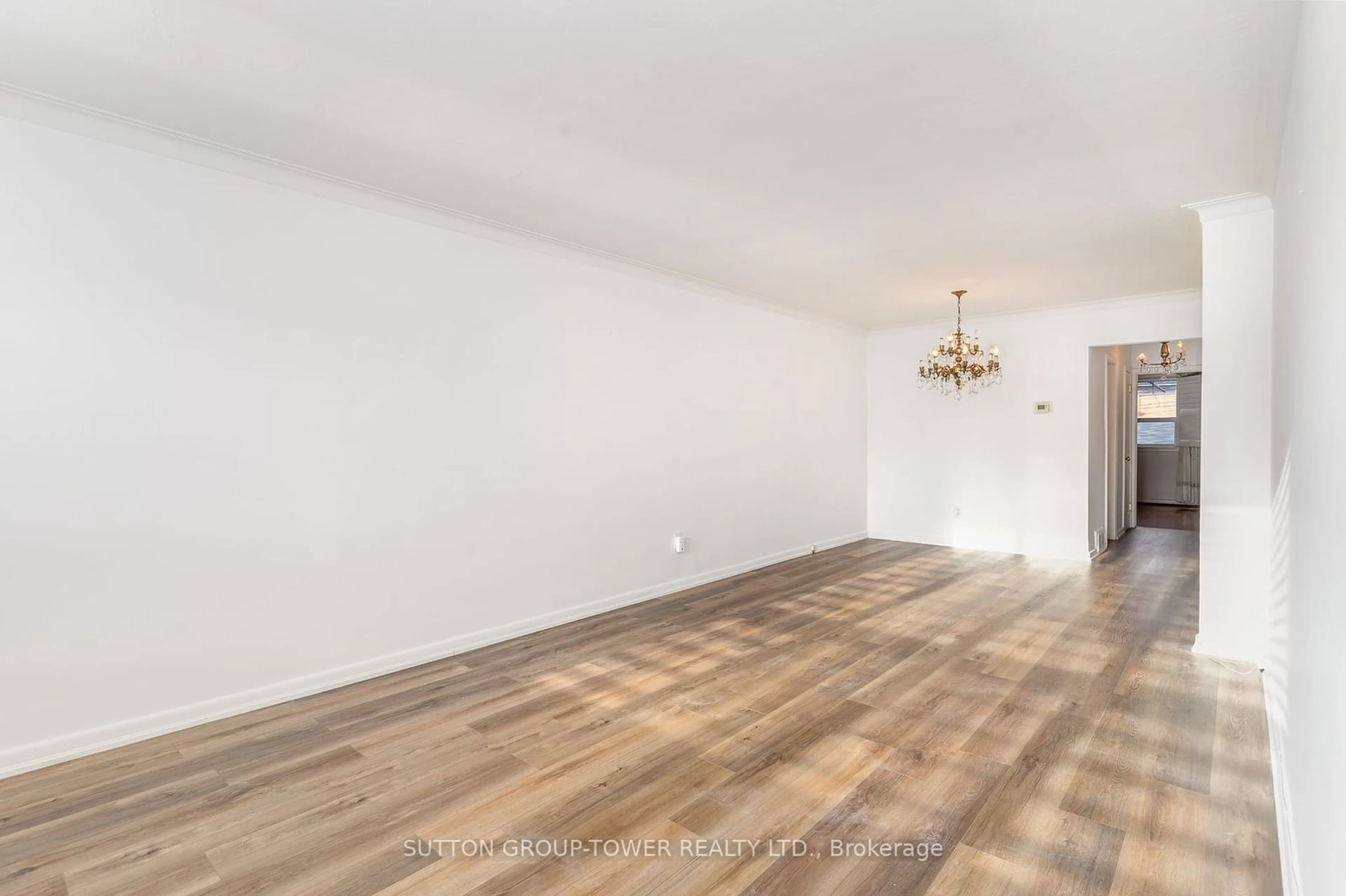 A pic of a room, wood floors for 126 Giltspur Dr, Toronto Ontario M3L 1M9