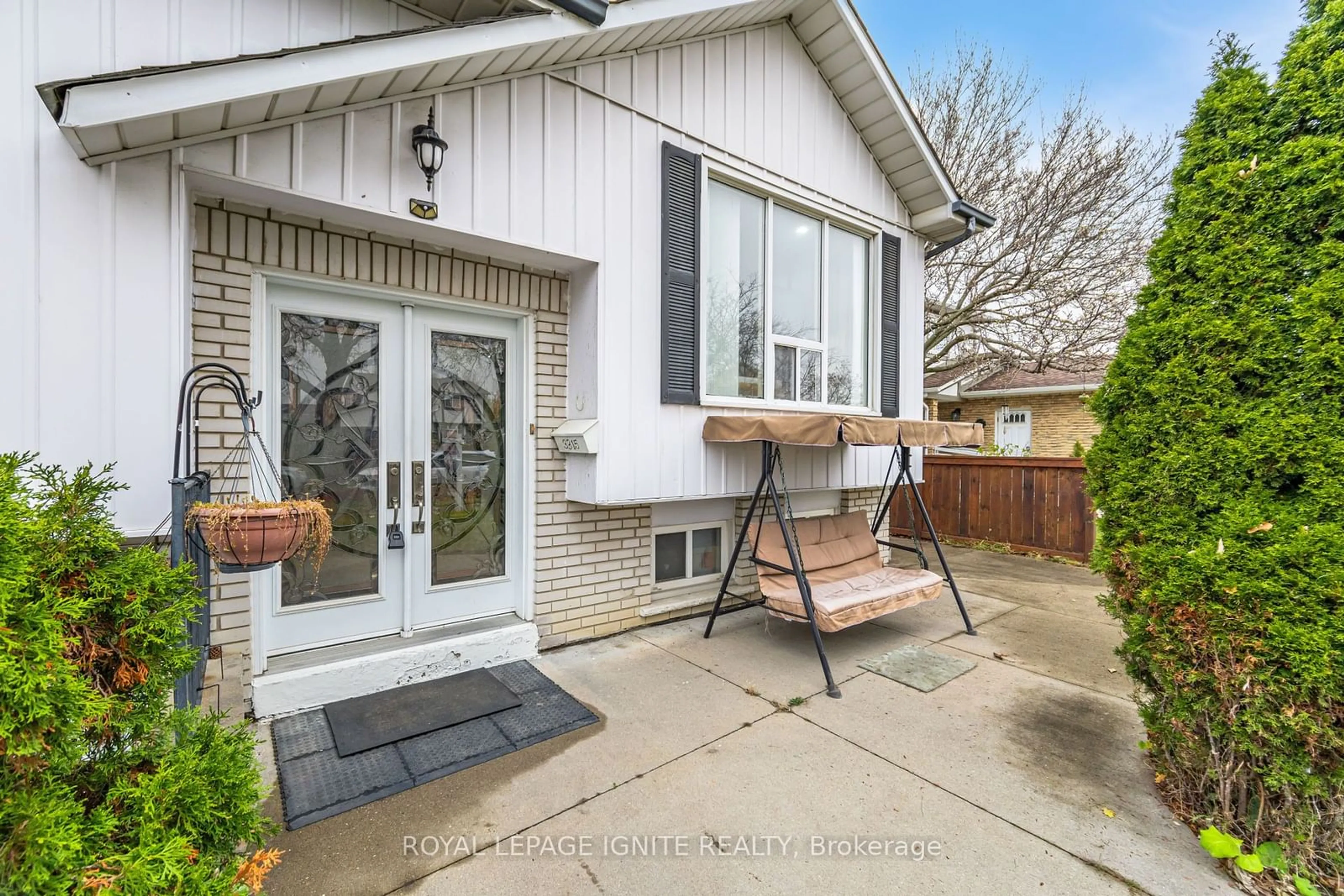 Frontside or backside of a home, the fenced backyard for 3315 Dwiggin Ave, Mississauga Ontario L4T 3J3