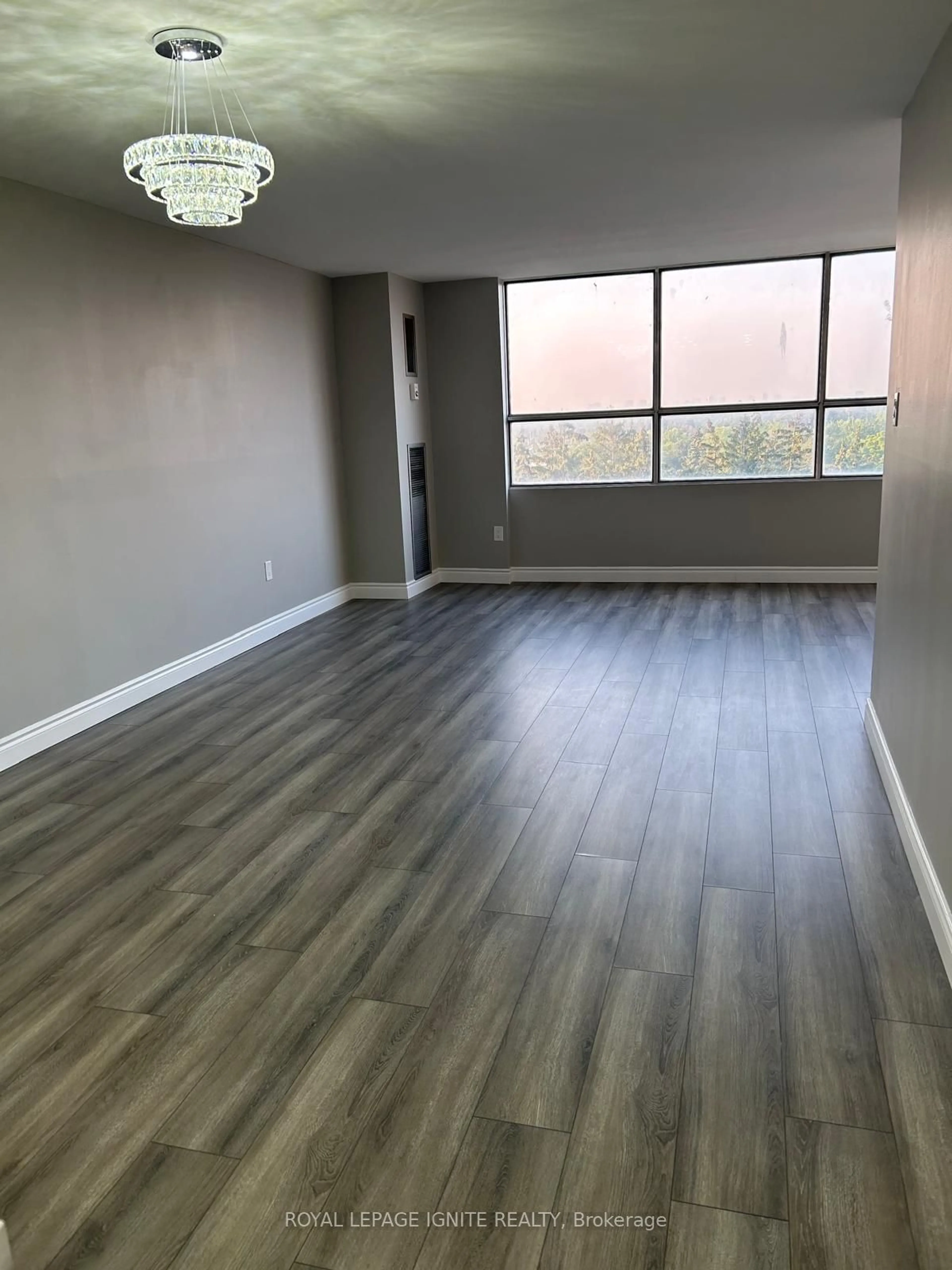 A pic of a room, wood floors for 40 Panorama Crt #910, Toronto Ontario M9V 4M1