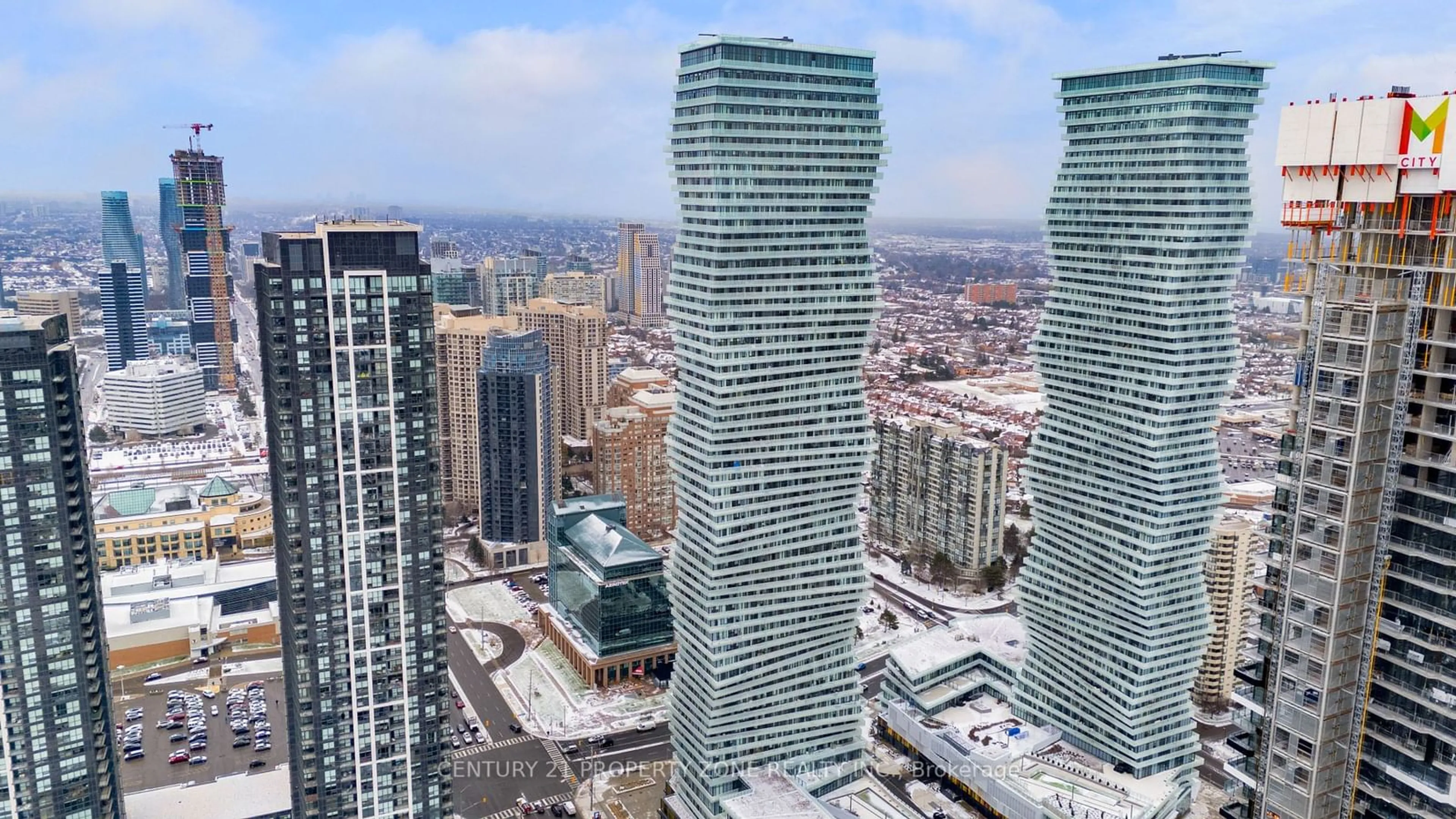 A pic from exterior of the house or condo, the view of city buildings for 3900 Confederation Pkwy #4904, Mississauga Ontario L5B 0M3