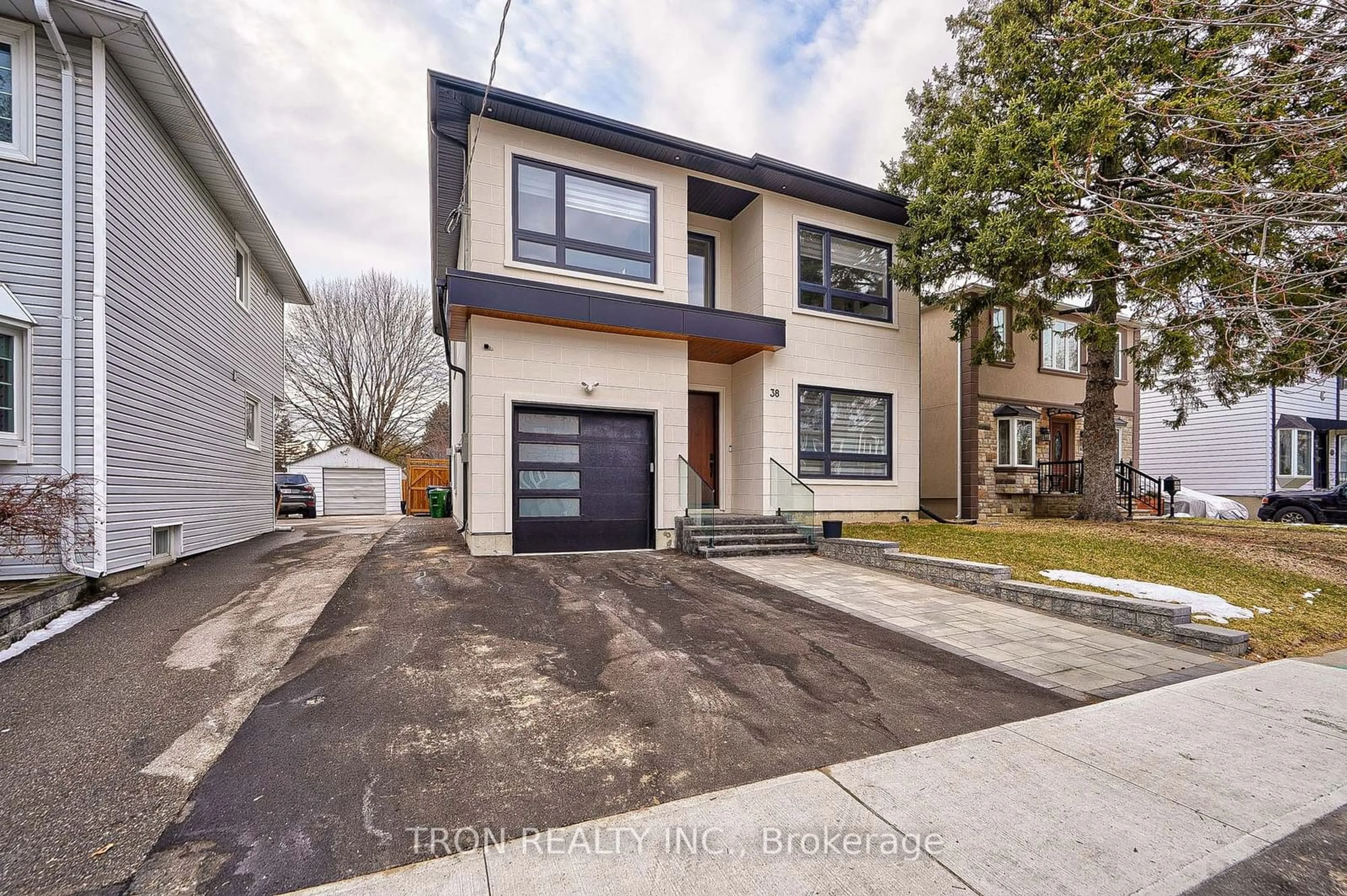 Frontside or backside of a home, the street view for 38 Uno Dr, Toronto Ontario M8Z 3N8