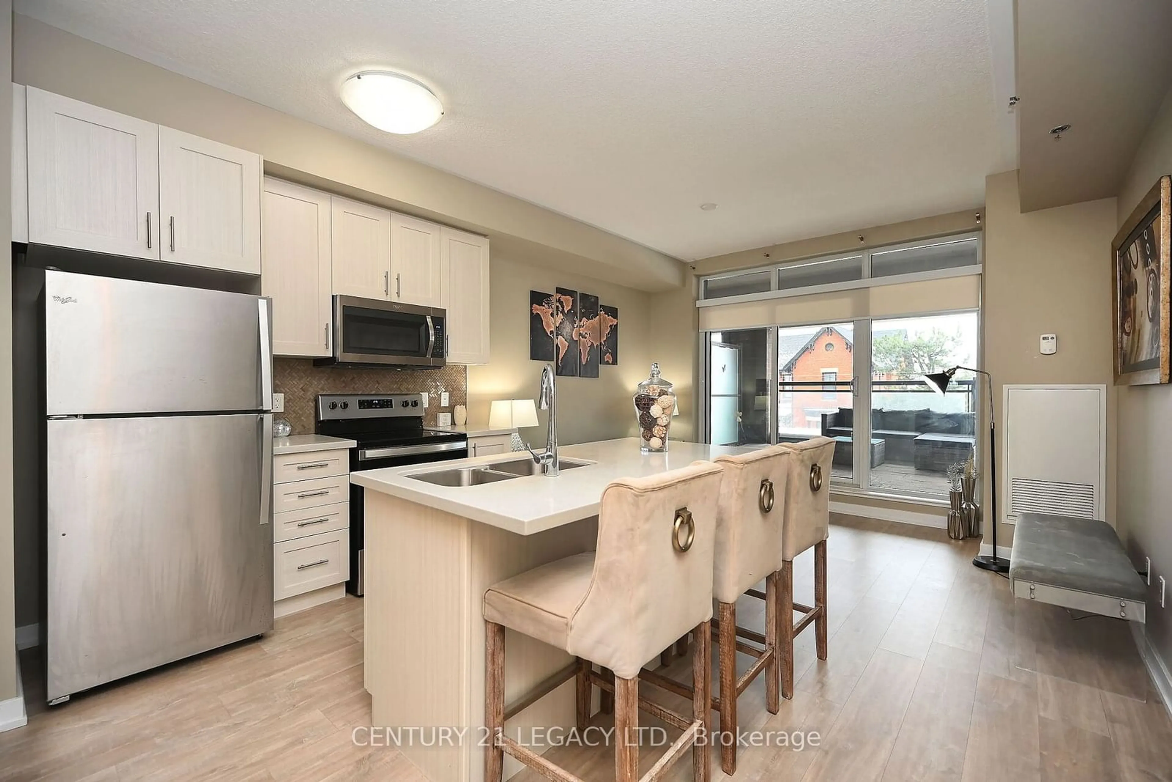 Open concept kitchen for 2486 Old Bronte Rd #212, Oakville Ontario L6M 4J2