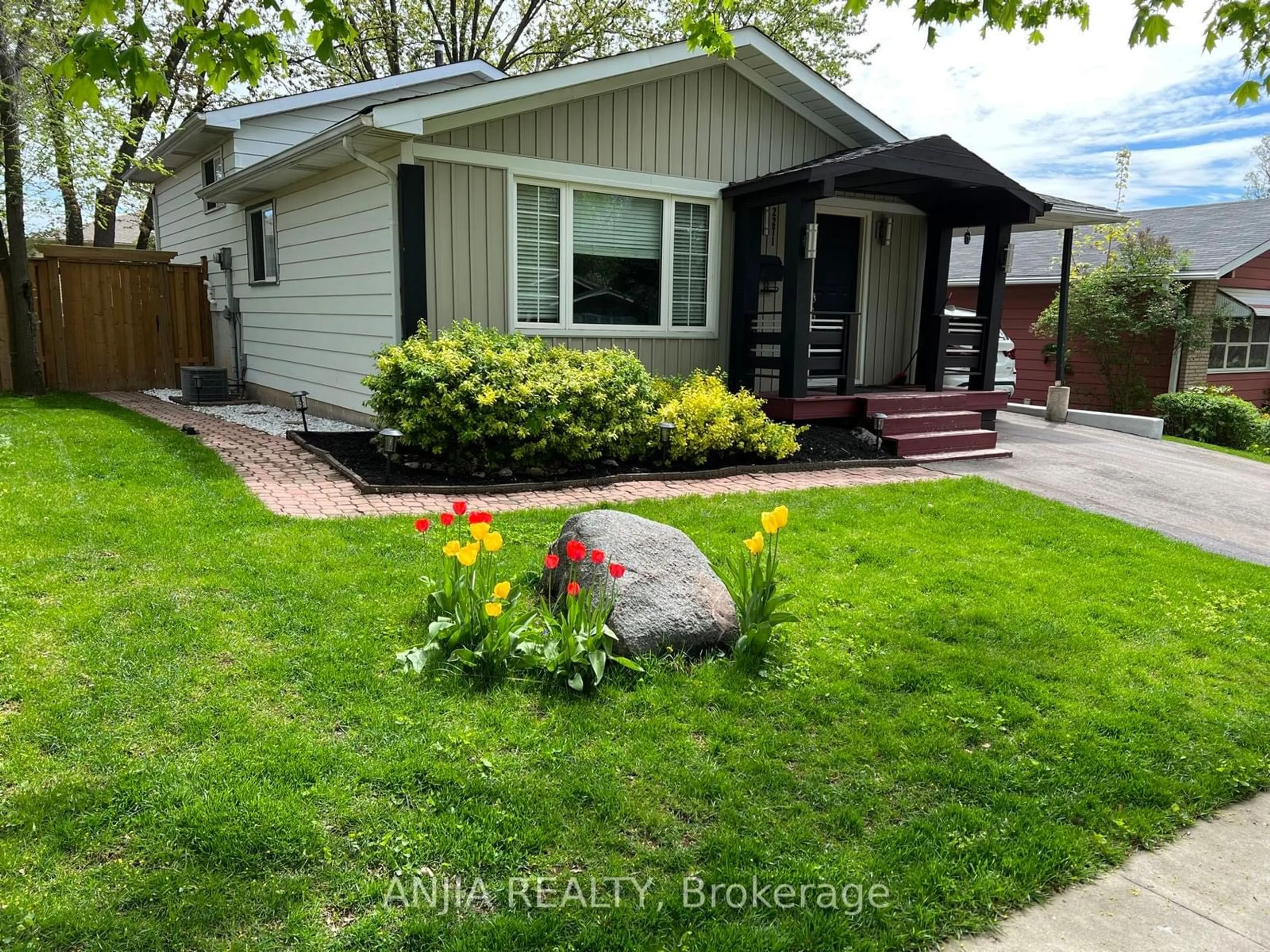 Frontside or backside of a home, the fenced backyard for 2271 Sheffield Dr, Burlington Ontario L7P 2X4