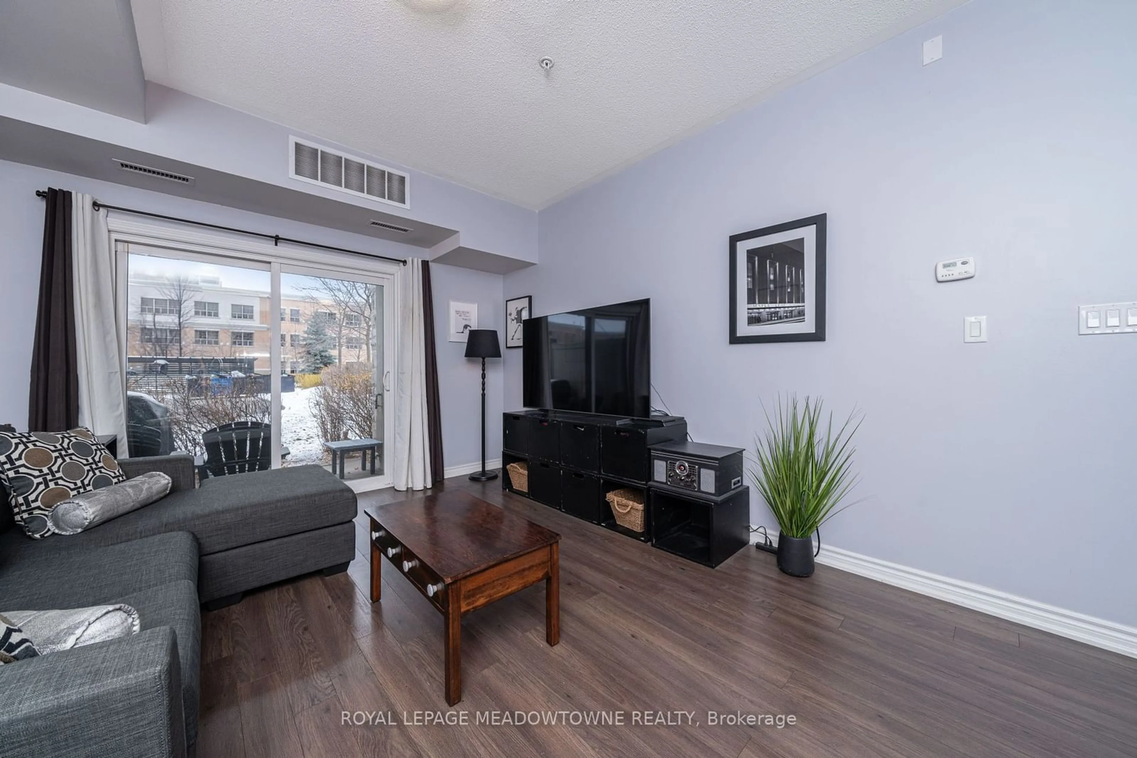 Living room, wood floors for 570 Lolita Gdns #125, Mississauga Ontario L5A 0A1