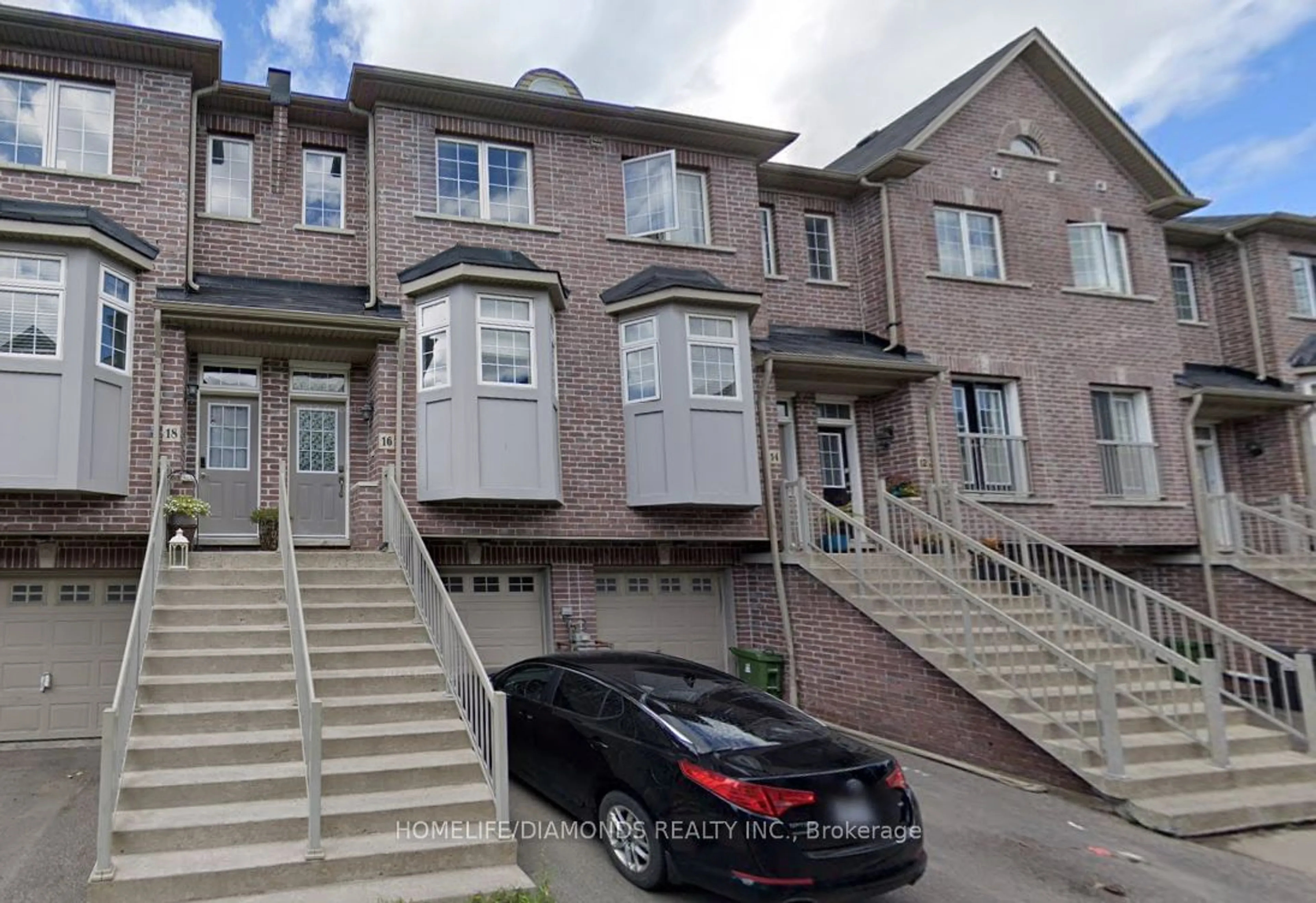 A pic from exterior of the house or condo, the street view for 16 Piggott Mews, Toronto Ontario M9N 0A4