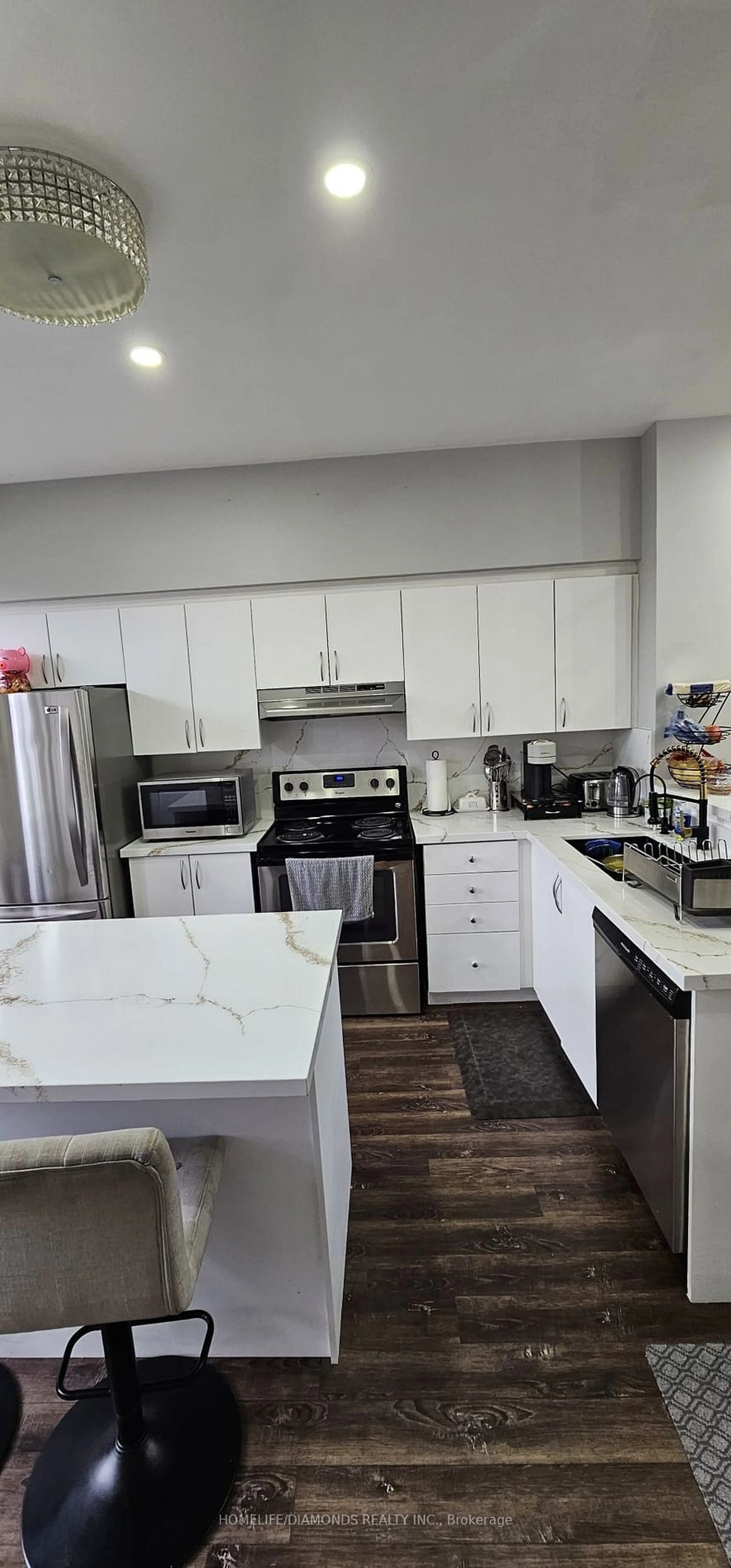 Open concept kitchen, unknown for 16 Piggott Mews, Toronto Ontario M9N 0A4