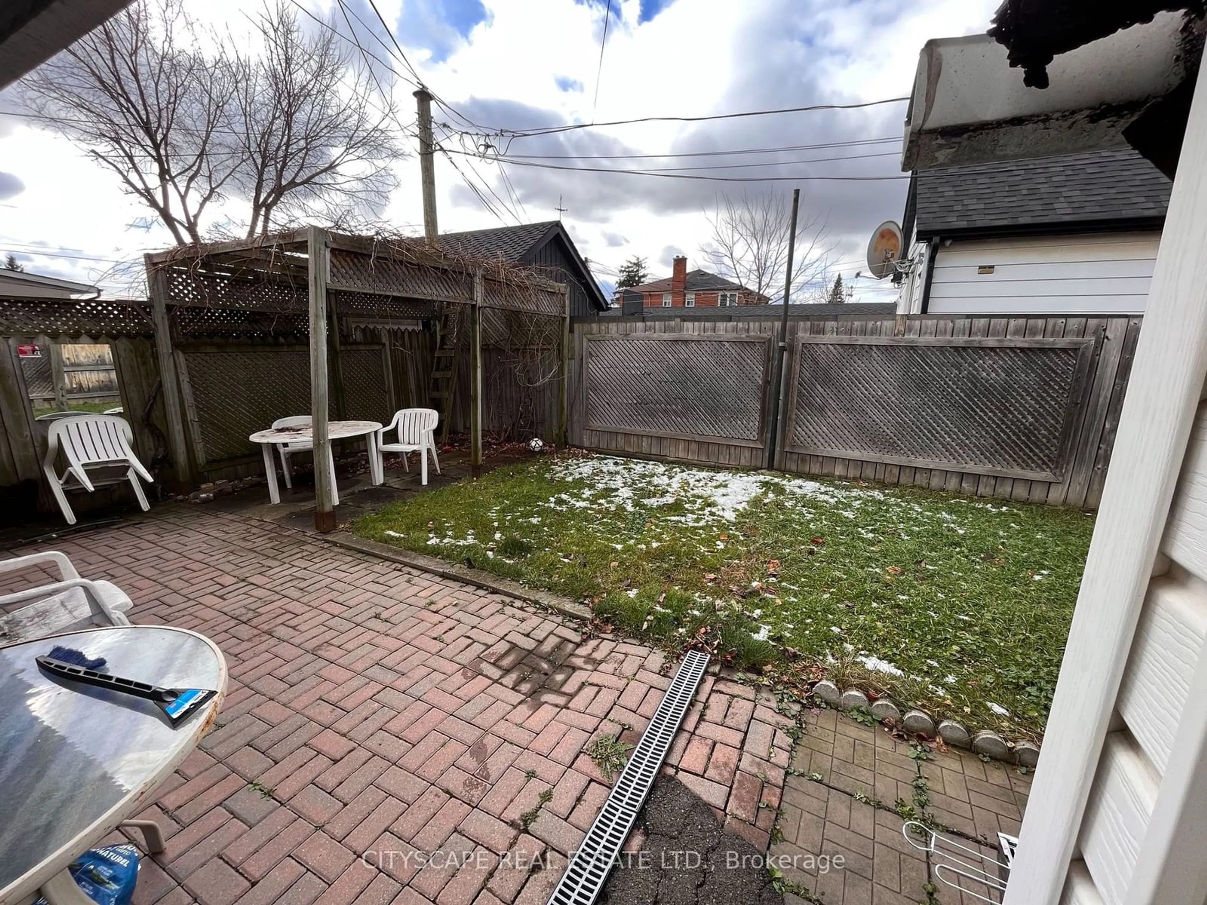 Patio, the fenced backyard for 244 Rosethorn Ave, Toronto Ontario M6M 3L1