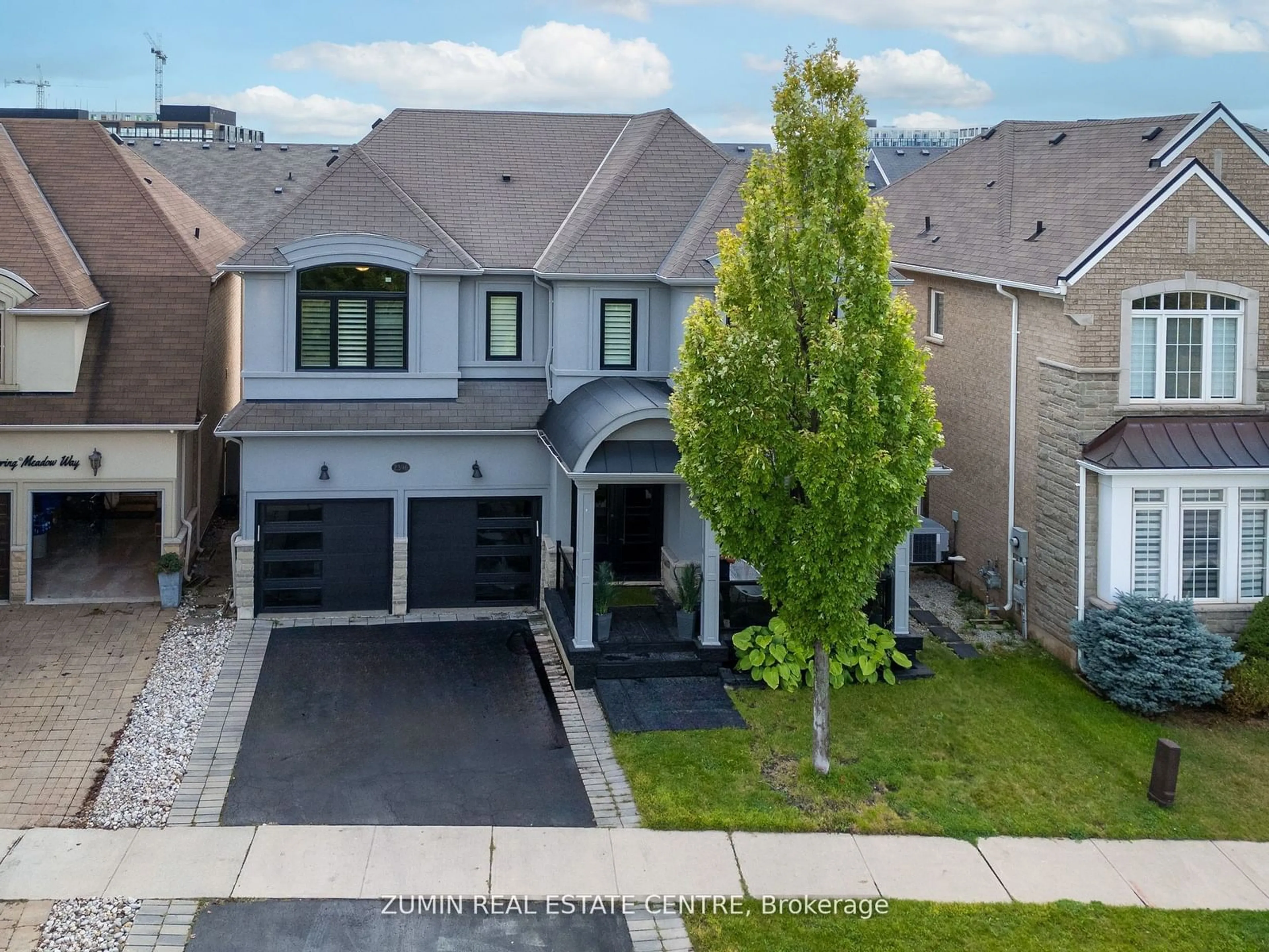 Frontside or backside of a home, the street view for 2396 Spring Meadow Way, Oakville Ontario L6M 0R6