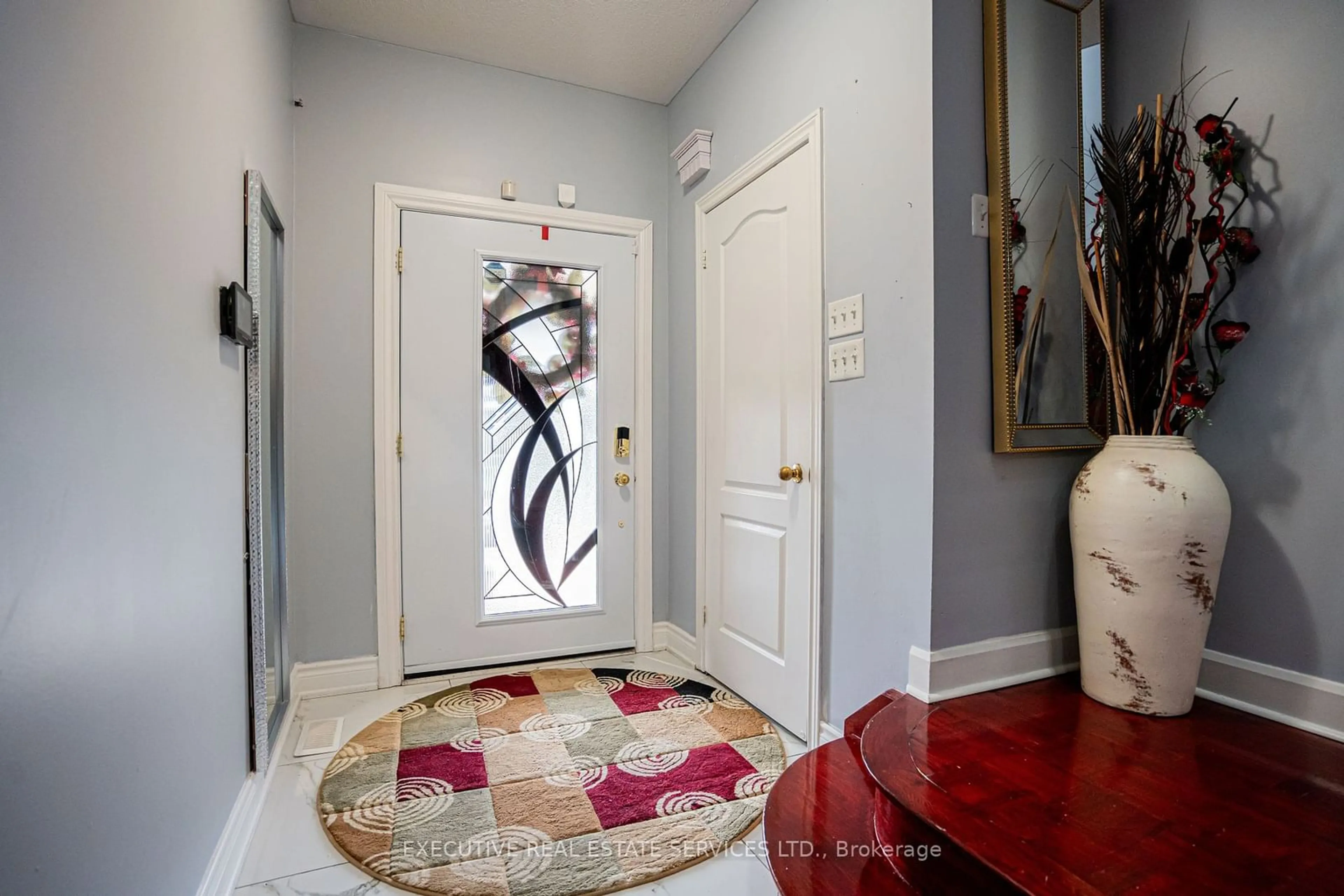 Indoor entryway, wood floors for 27 Savita Rd, Brampton Ontario L7A 3V1