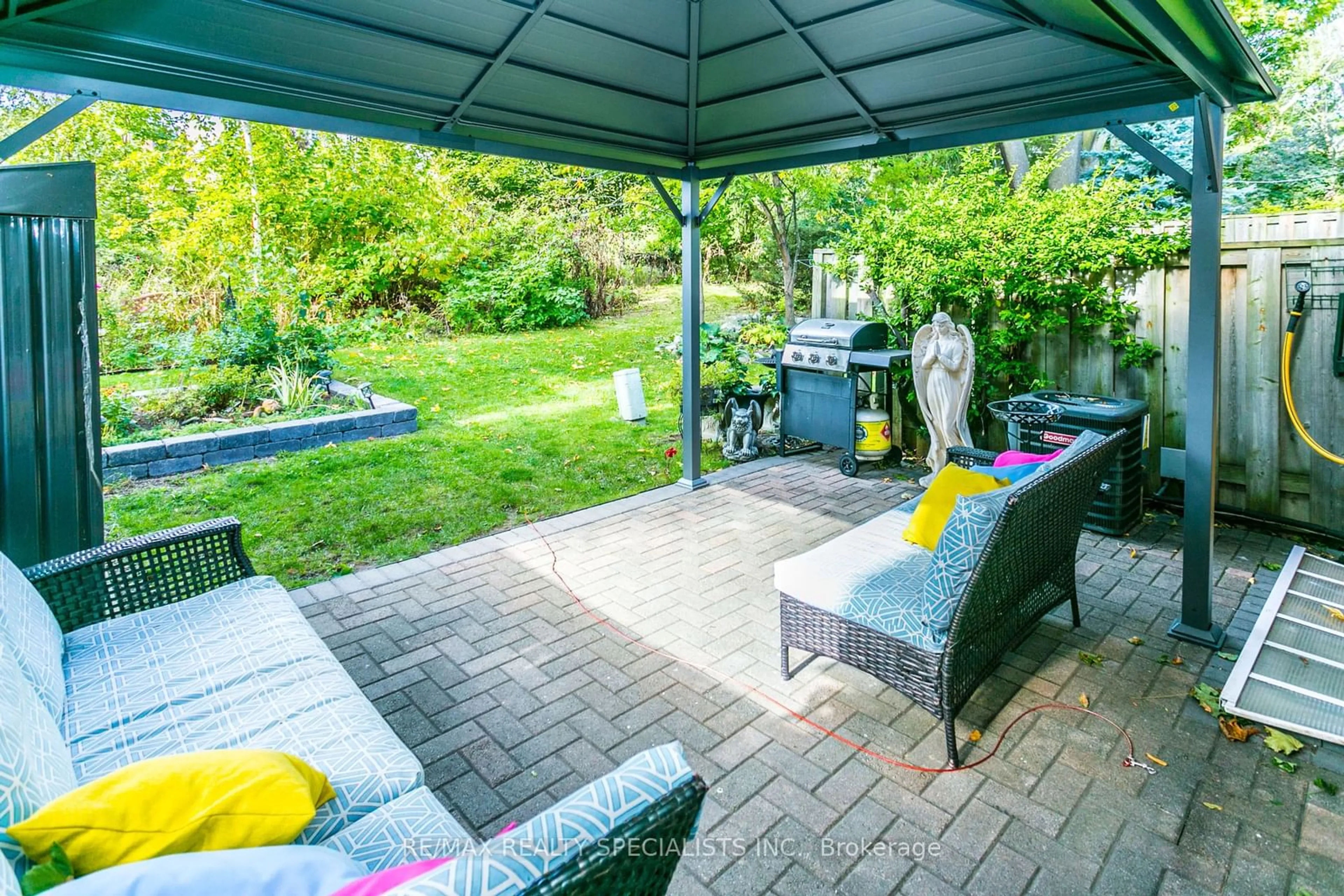 Patio, the fenced backyard for 3400 Rhonda Valley Blvd #5, Mississauga Ontario L5A 3L9