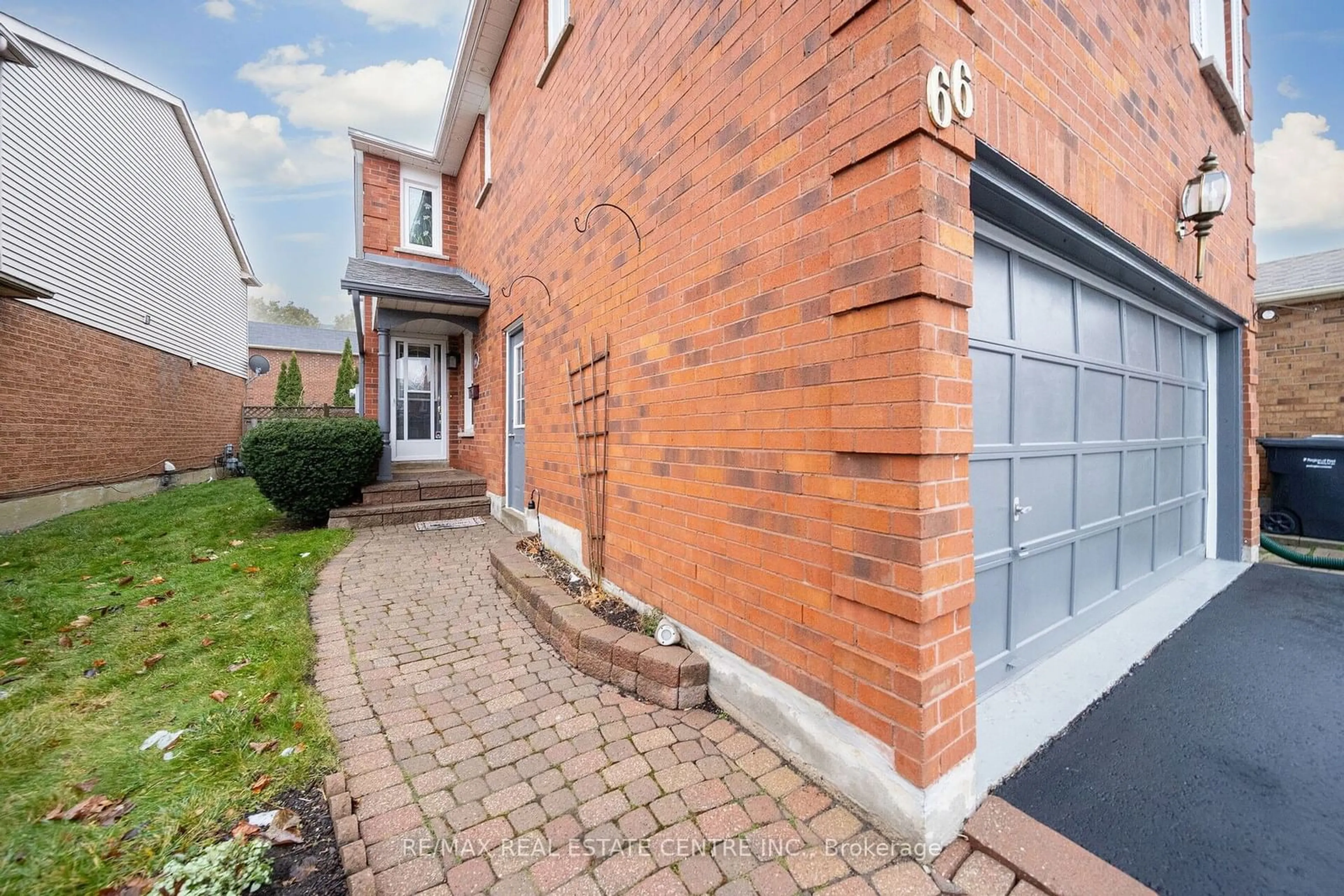 Home with brick exterior material, street for 66 Acadian Hts, Brampton Ontario L6Y 4H2