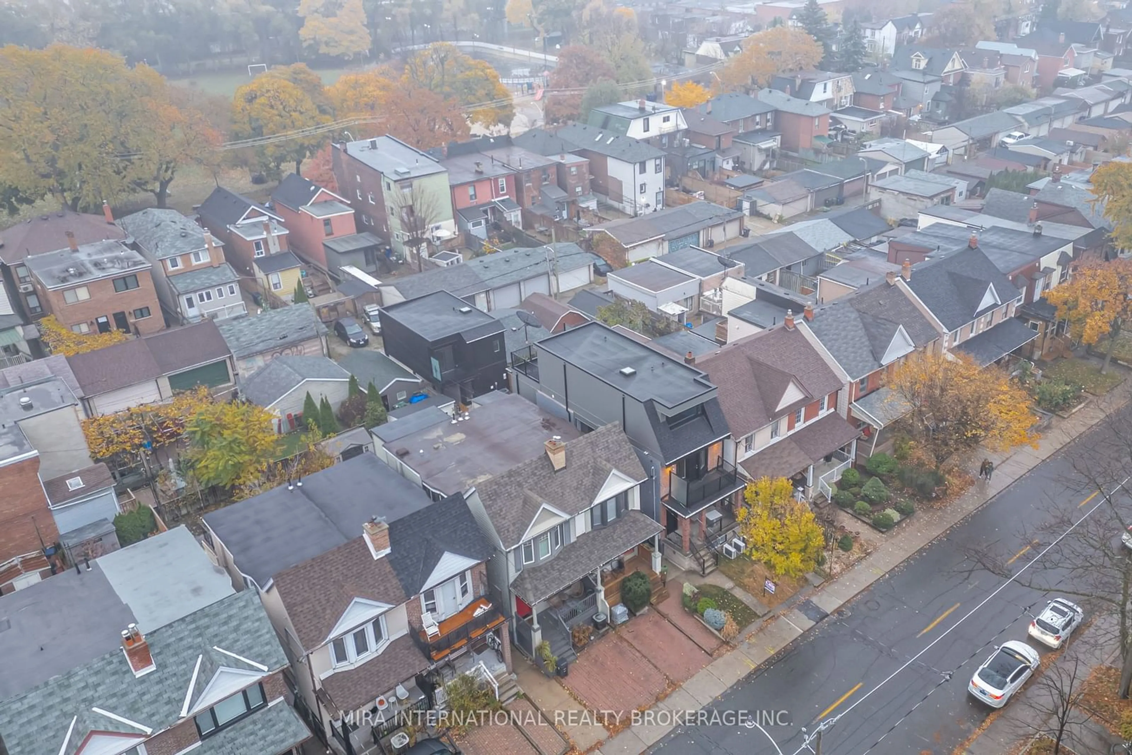 A pic from outside/outdoor area/front of a property/back of a property/a pic from drone, city buildings view from balcony for 231 Symington Ave, Toronto Ontario M6P 3W5