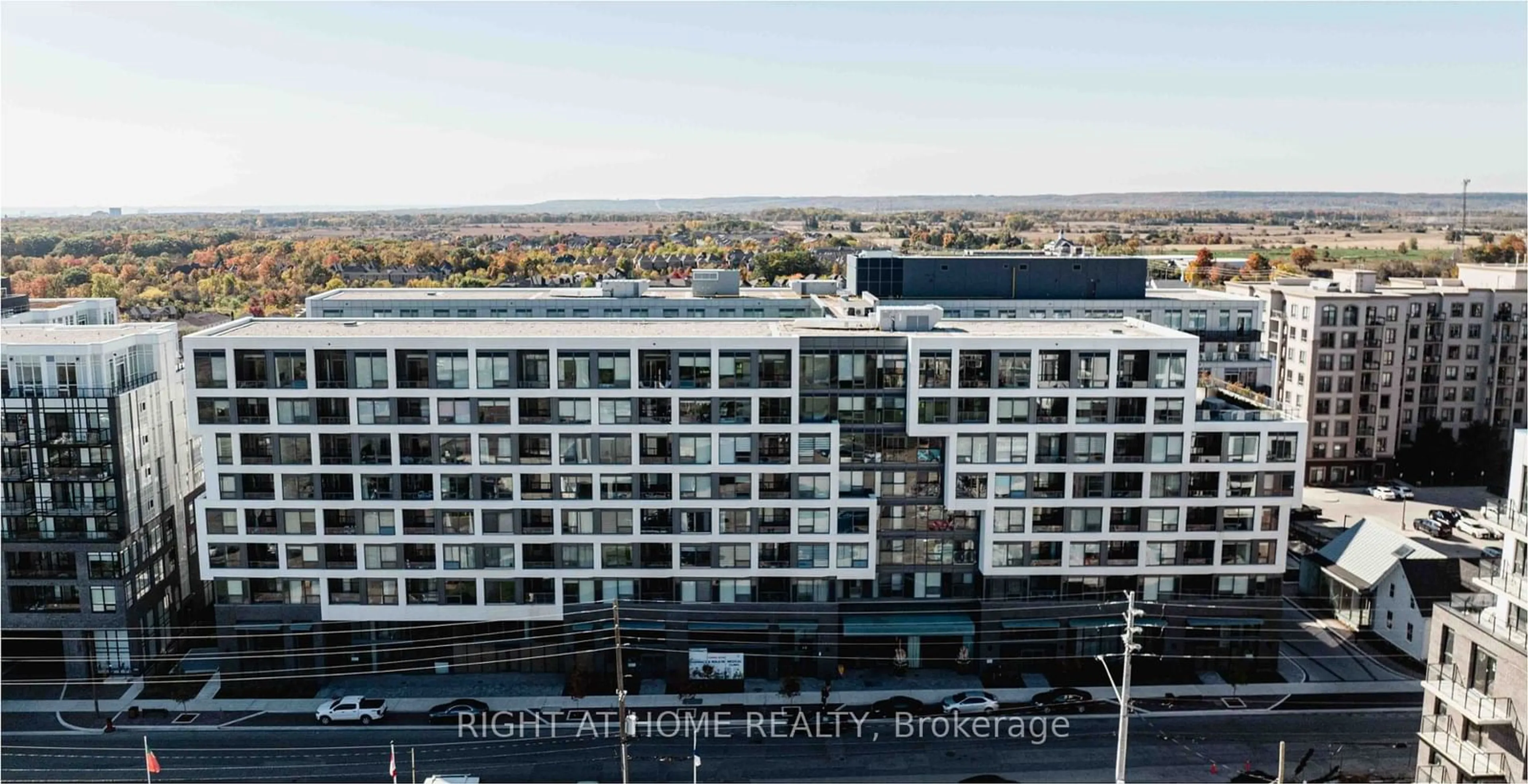 A pic from outside/outdoor area/front of a property/back of a property/a pic from drone, city buildings view from balcony for 2450 Old Bronte Rd #833, Oakville Ontario L6M 5P6