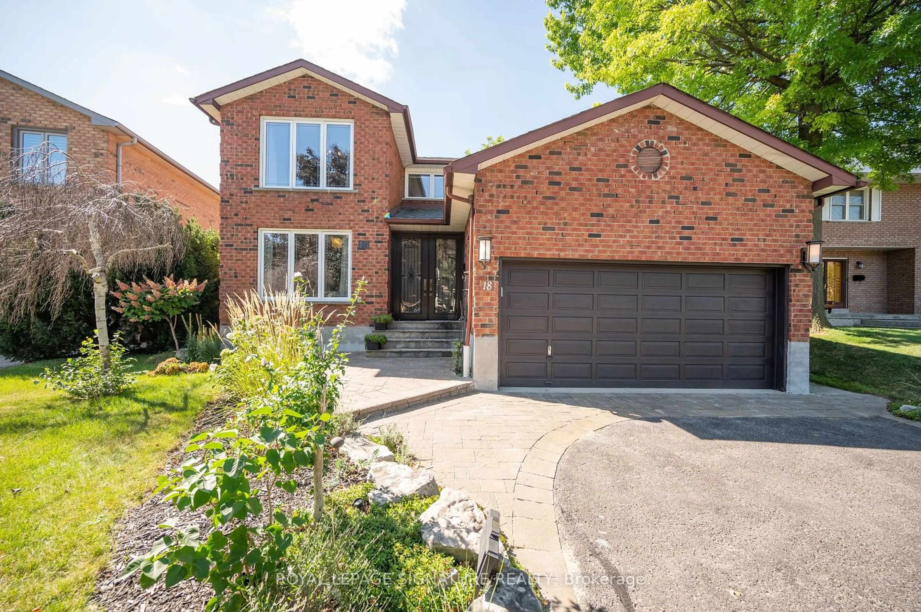 Home with brick exterior material, street for 18 Esposito Crt, Toronto Ontario M9C 5H6