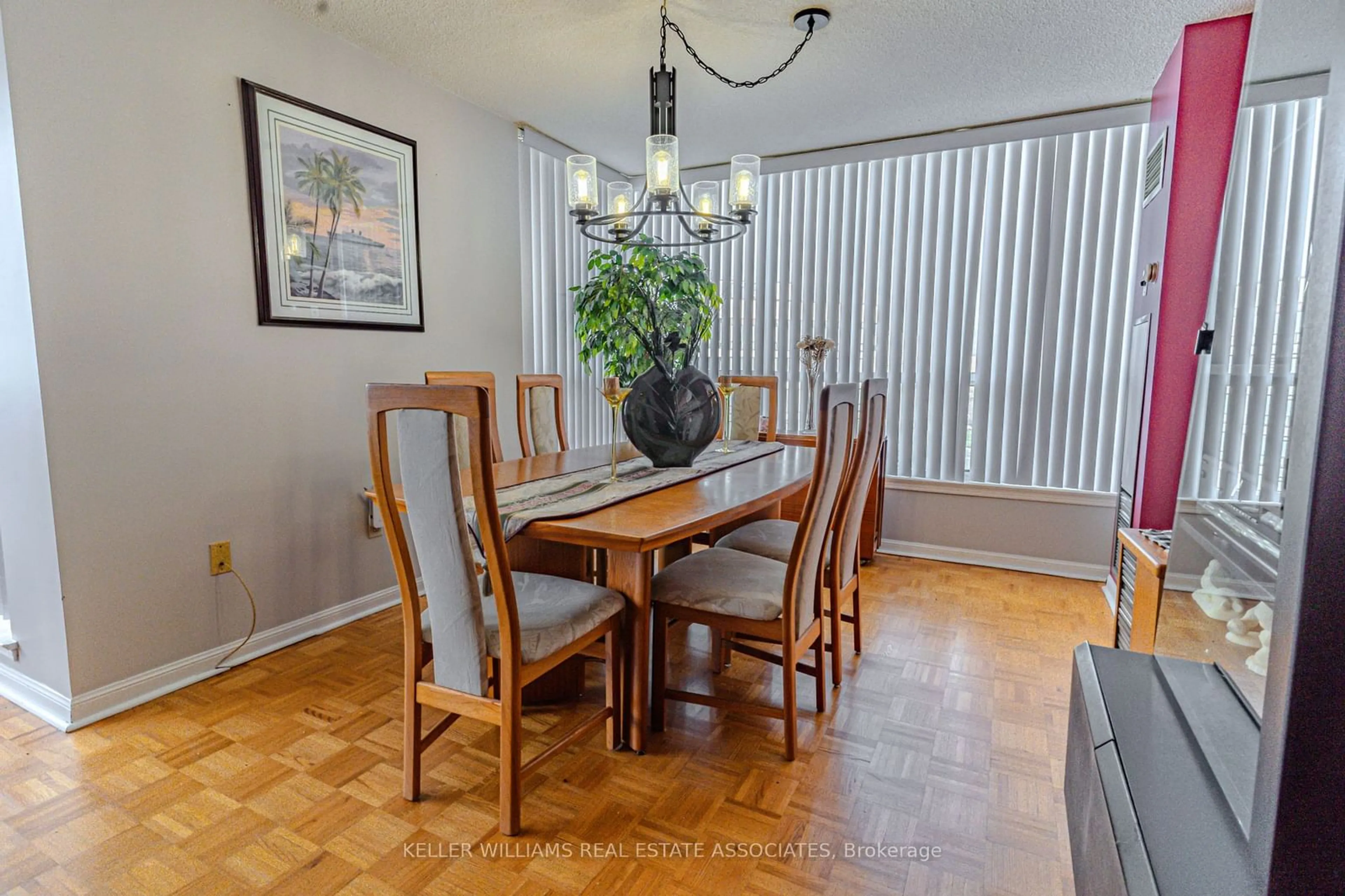 Dining room, wood/laminate floor for 12 Laurelcrest St #1112, Brampton Ontario L6S 5Y4