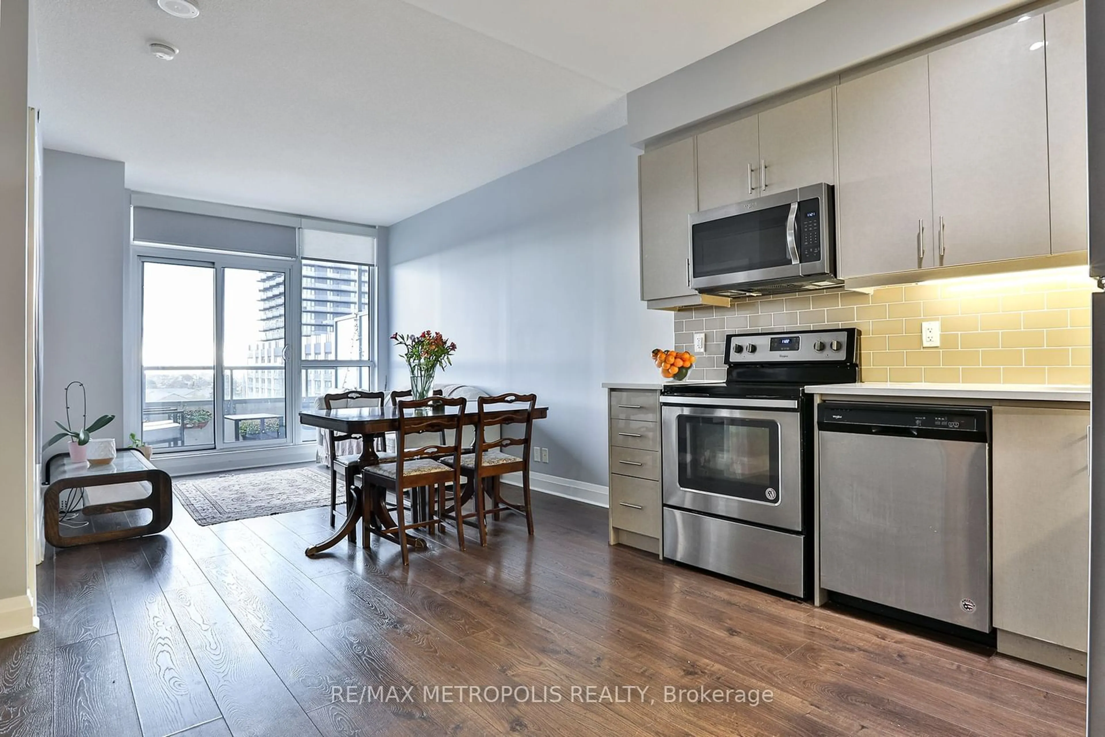 Open concept kitchen, wood/laminate floor for 15 Zorra St #404, Toronto Ontario M8Z 0C1