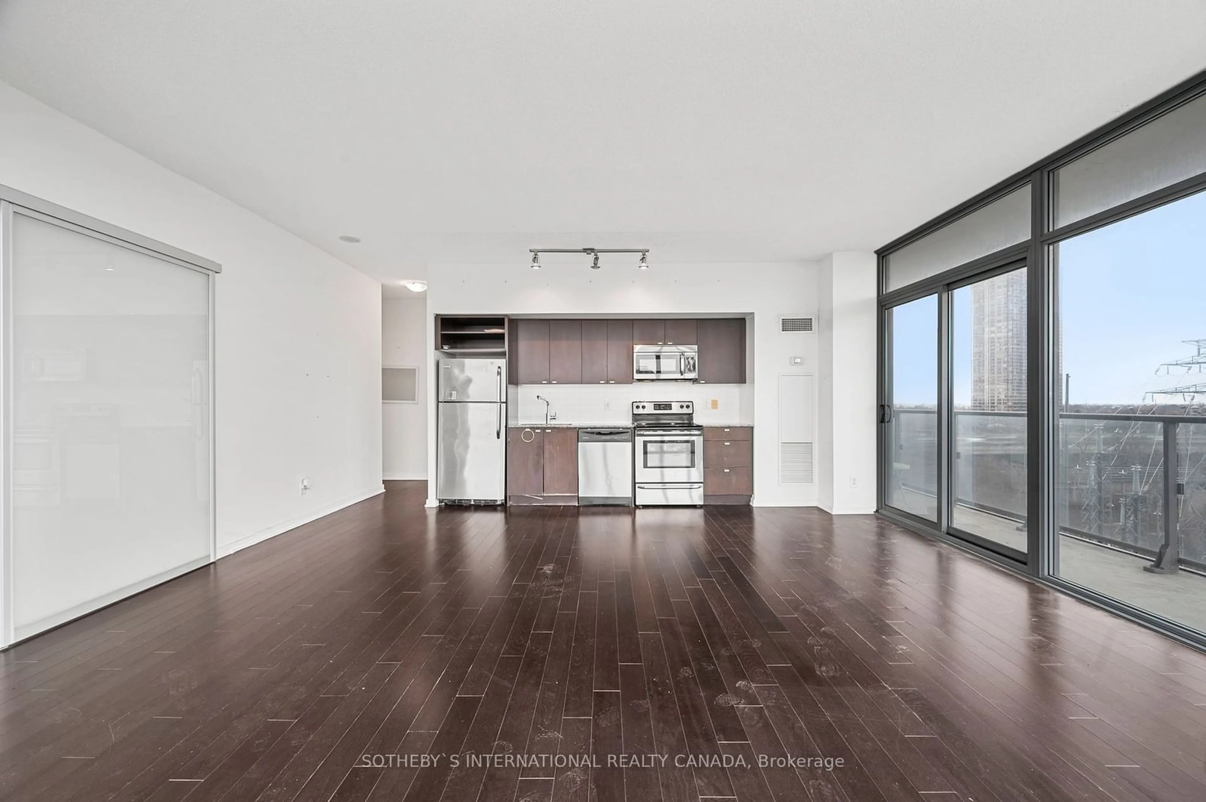 Open concept kitchen, wood/laminate floor for 105 The Queensway #710, Toronto Ontario M6S 5B5