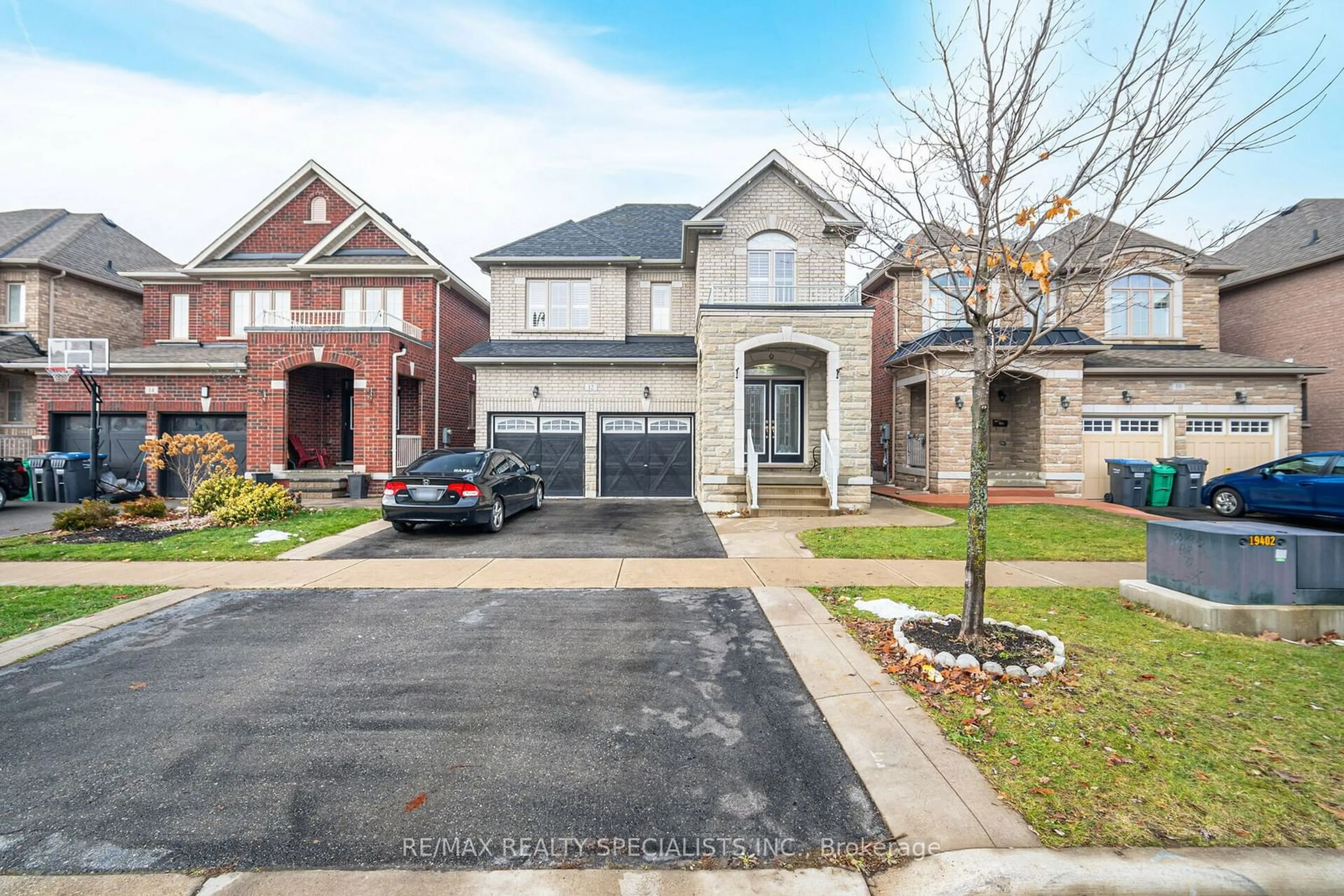 Home with brick exterior material, street for 12 Ricardo Rd, Brampton Ontario L6P 3Z1