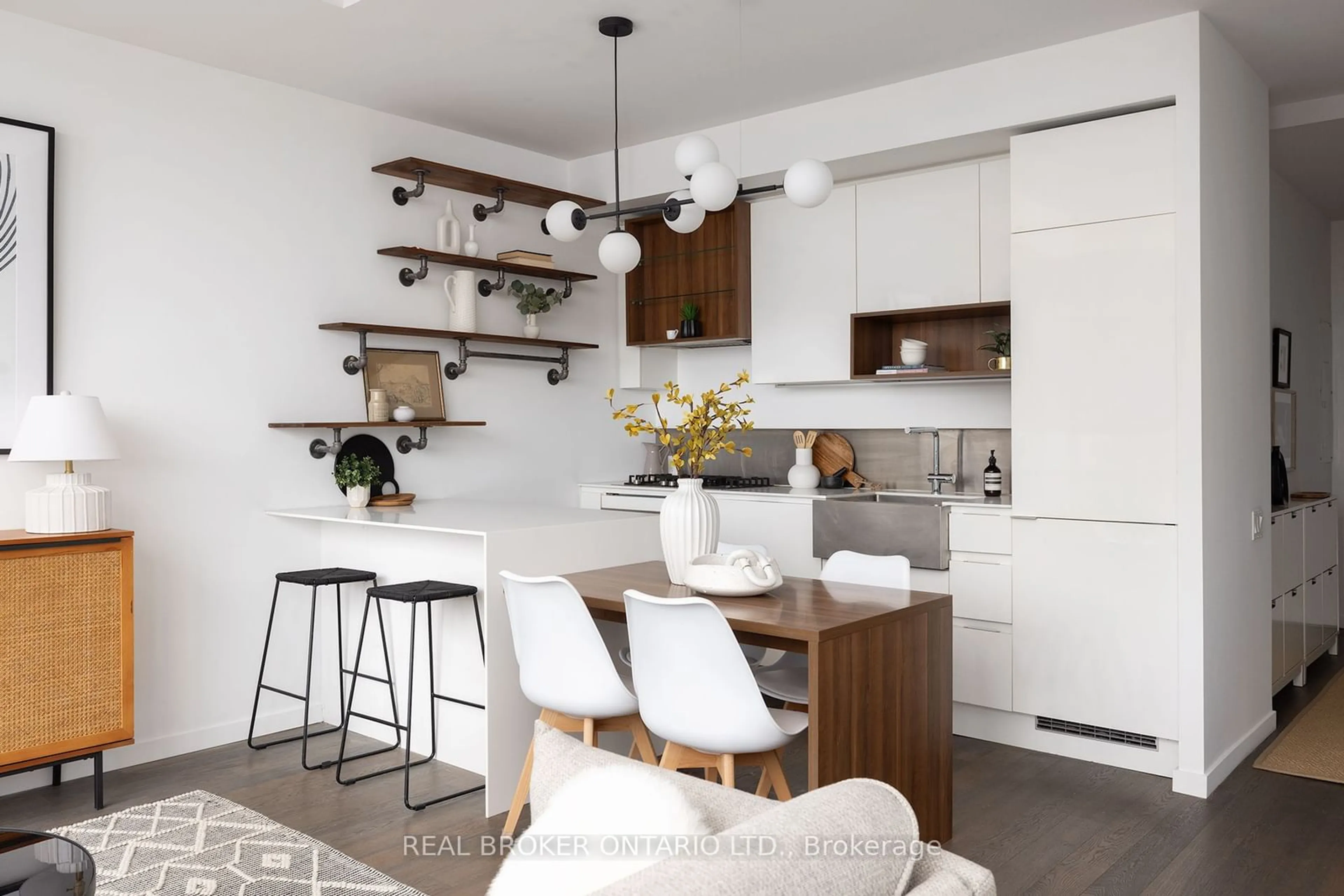 Open concept kitchen, wood/laminate floor for 383 Sorauren Ave #PH12, Toronto Ontario M6R 0A4