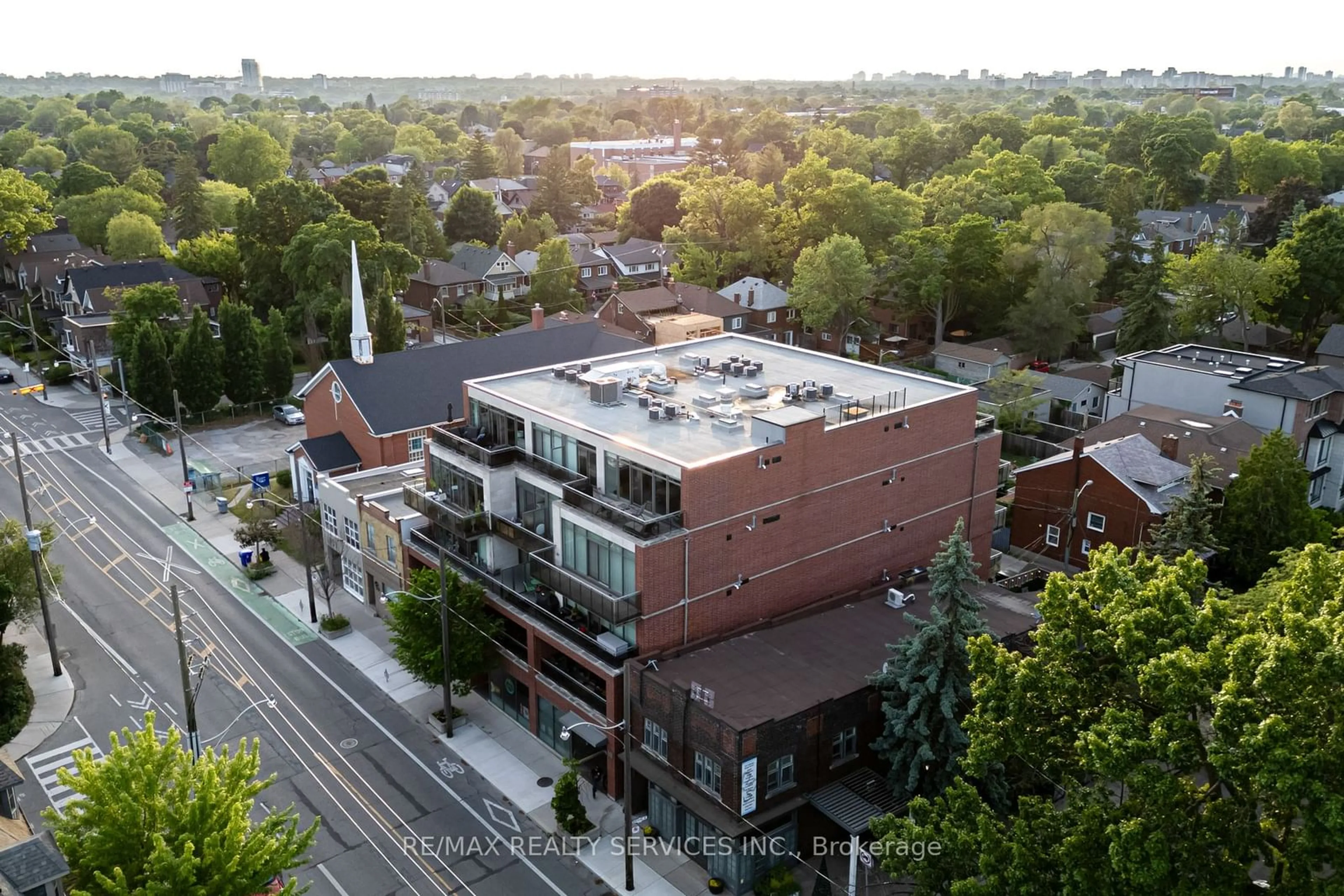 A pic from outside/outdoor area/front of a property/back of a property/a pic from drone, city buildings view from balcony for 588 Annette St #503, Toronto Ontario M6S 2C4