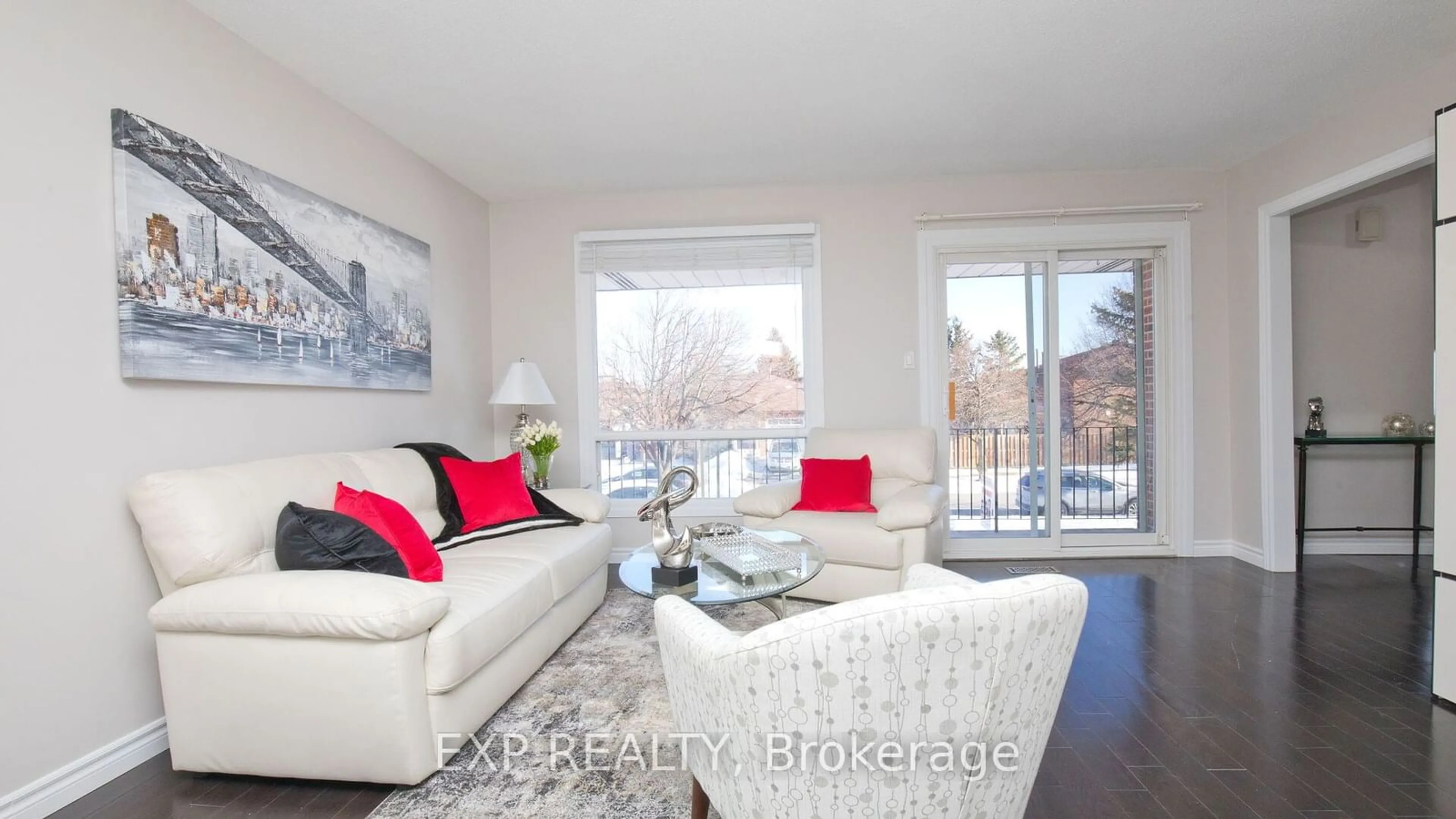 Living room with furniture, wood/laminate floor for 38 Panorama Cres, Brampton Ontario L6S 3T9