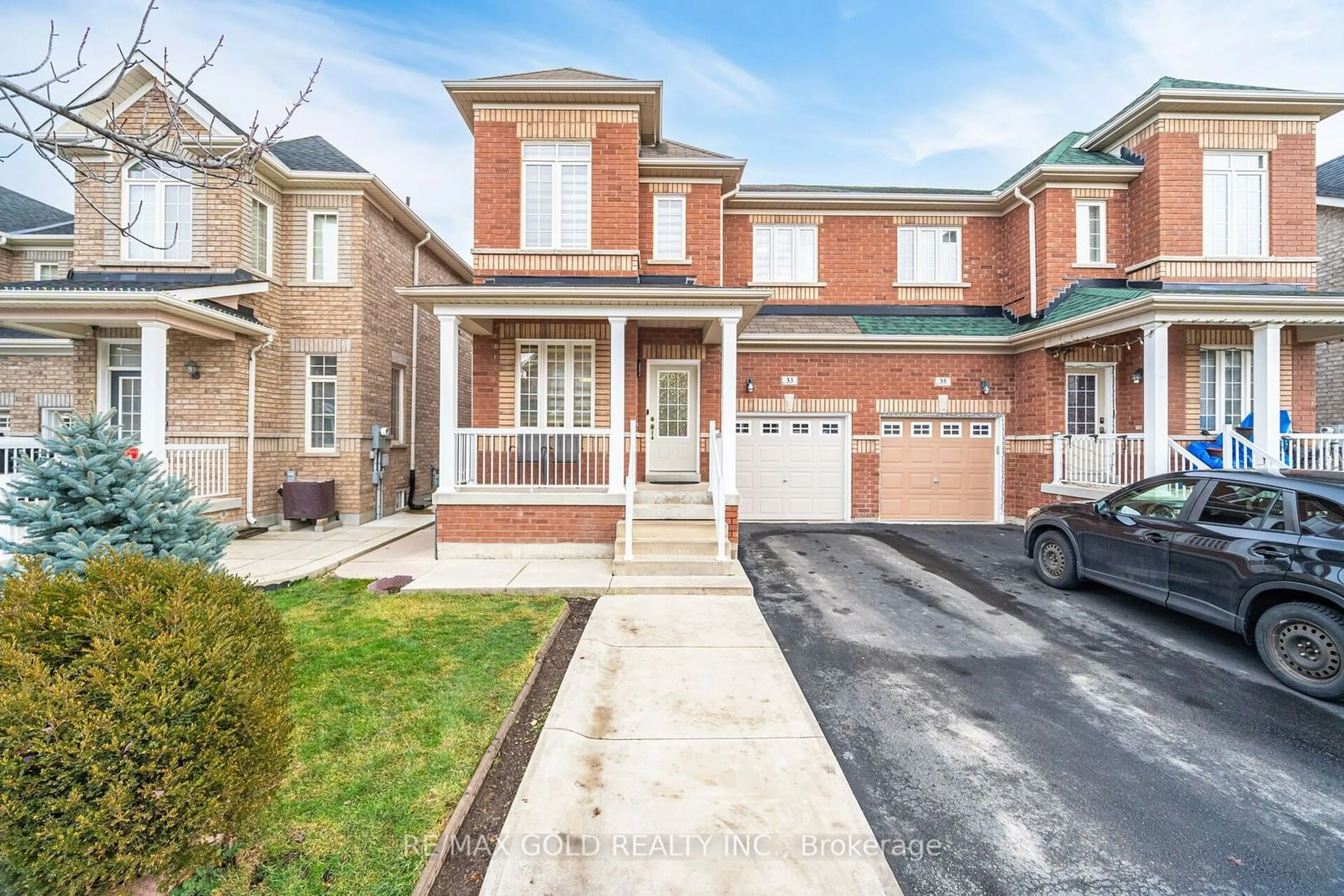 Home with brick exterior material, street for 33 Callalily Rd, Brampton Ontario L7A 0M3