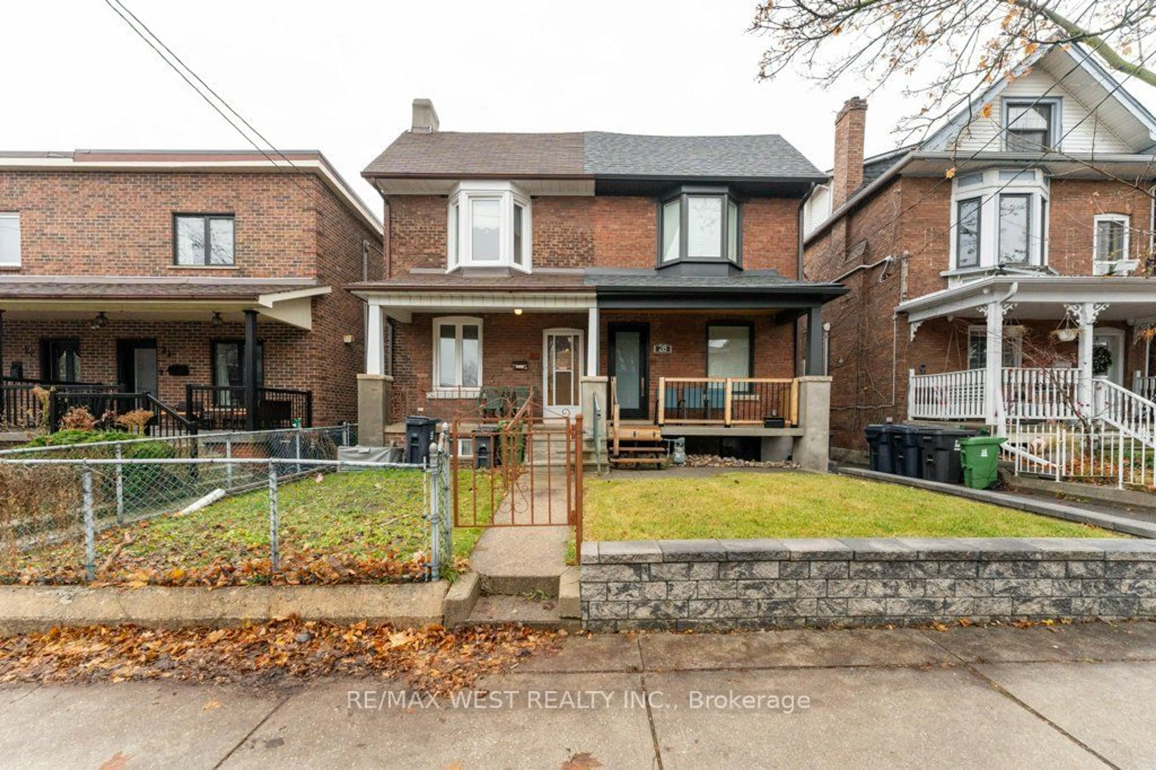 Home with brick exterior material, street for 26 Greenlaw Ave, Toronto Ontario M6H 3V5