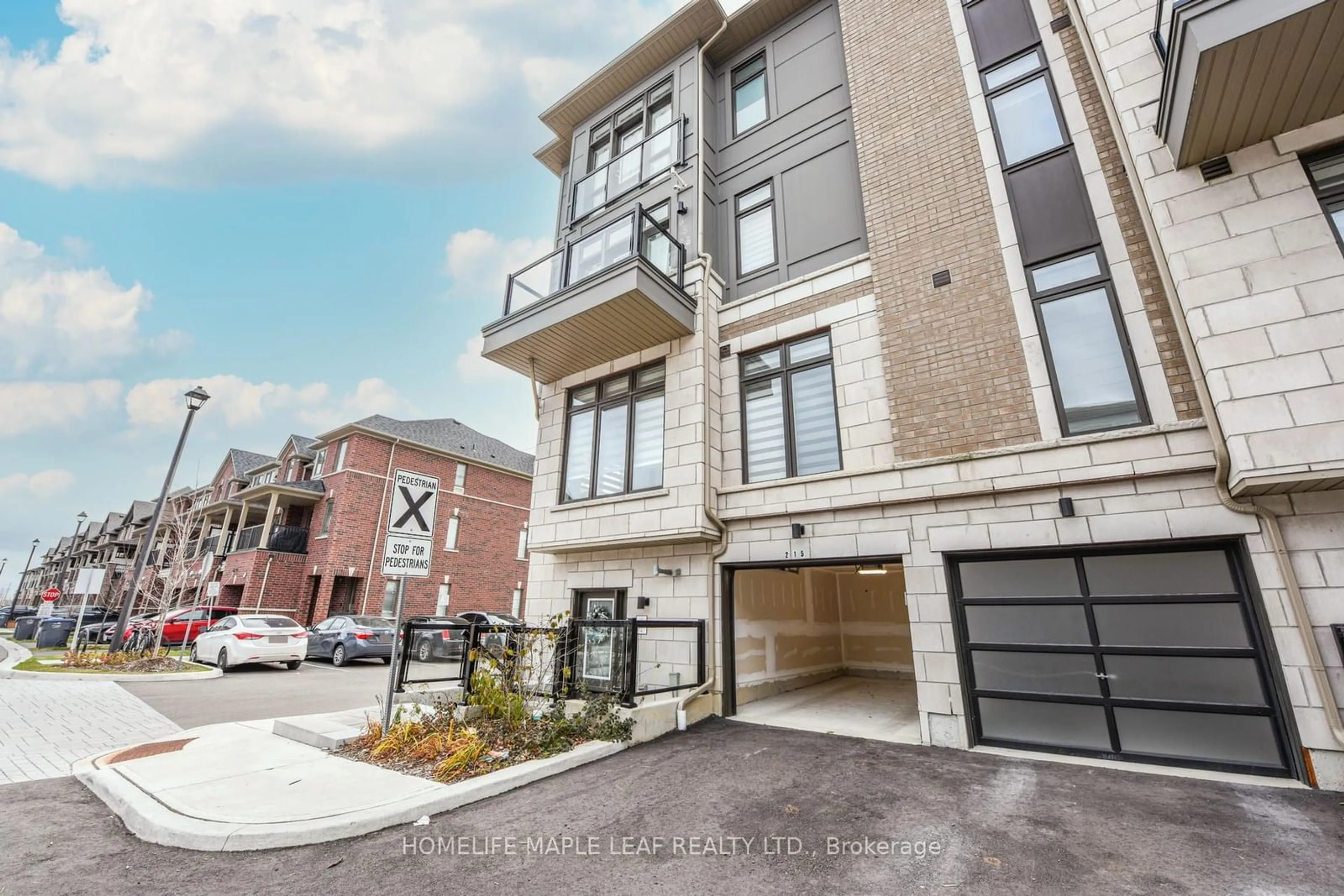 Home with brick exterior material, street for 30 Halliford Pl #215, Brampton Ontario L6P 4R1