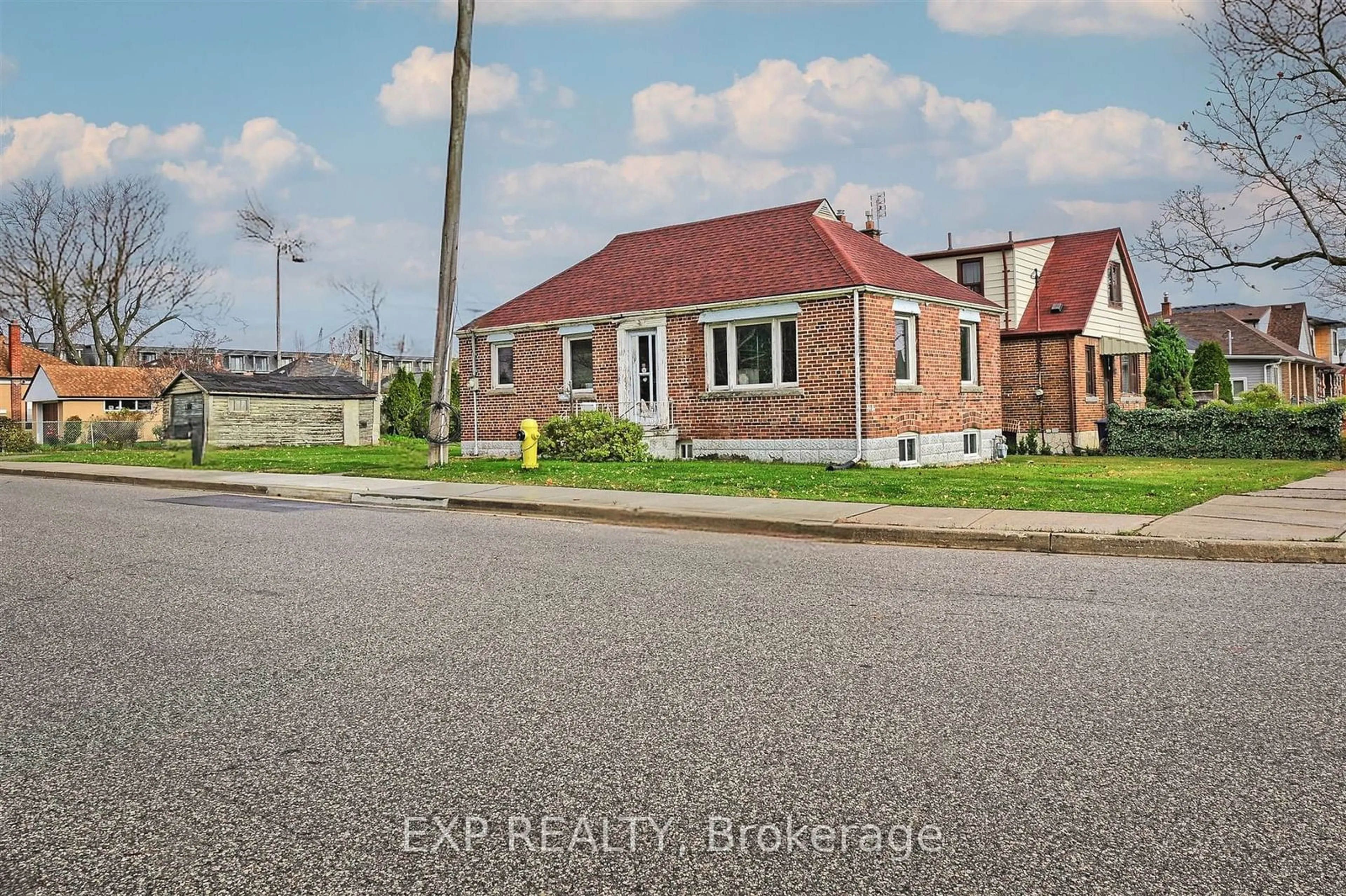 A pic from outside/outdoor area/front of a property/back of a property/a pic from drone, street for 414 Melrose St, Toronto Ontario M8Z 1H1