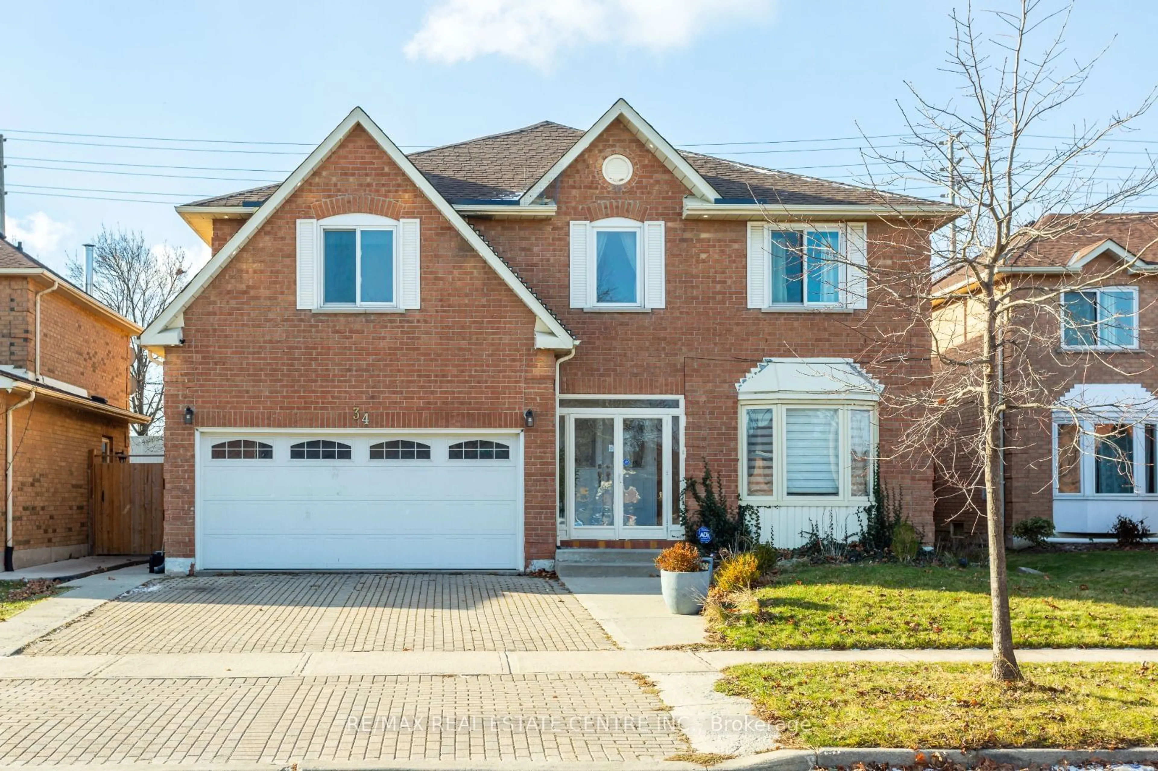 Home with brick exterior material, street for 34 Corkett Dr, Brampton Ontario L6X 3G9