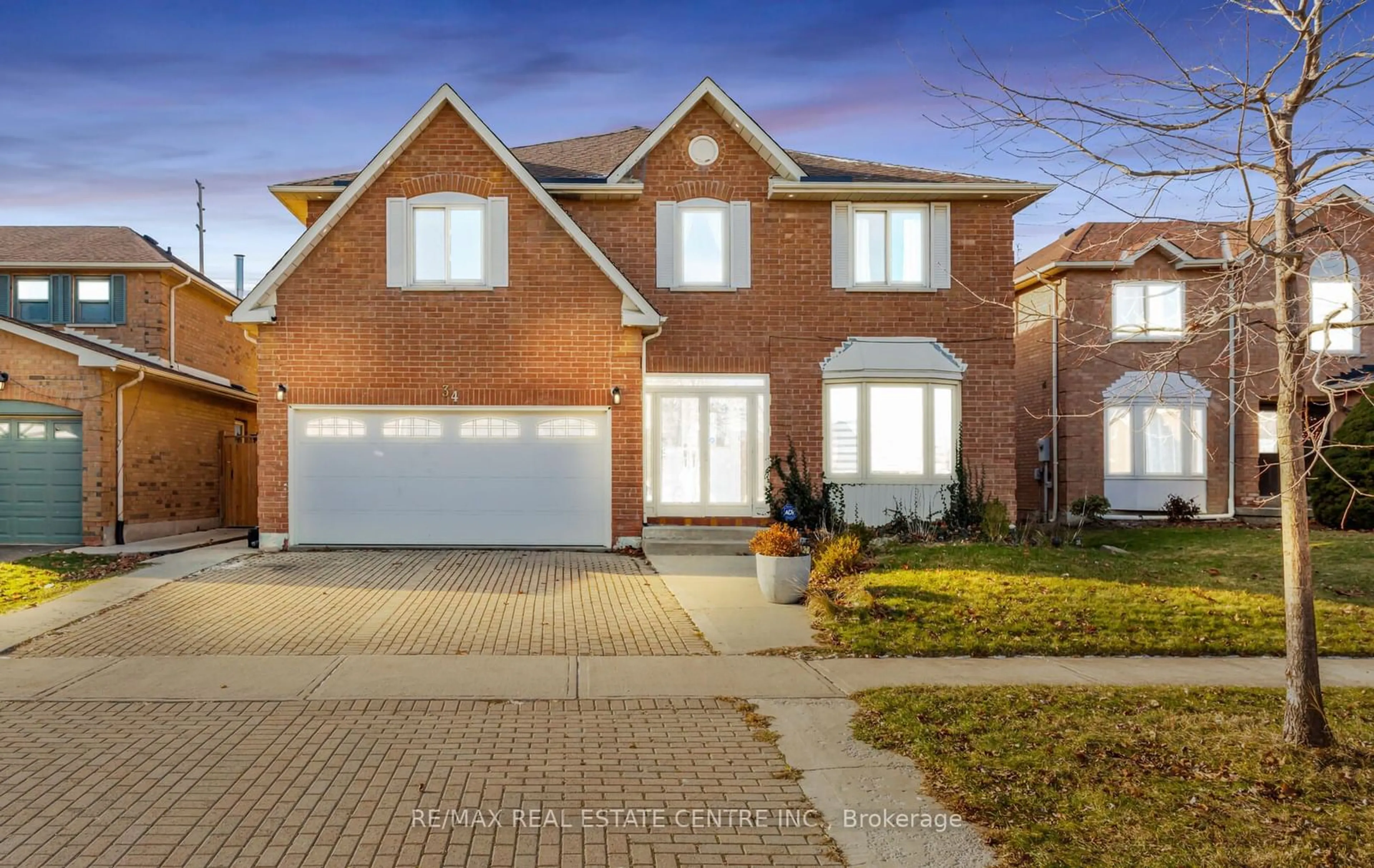 Home with brick exterior material, street for 34 Corkett Dr, Brampton Ontario L6X 3G9