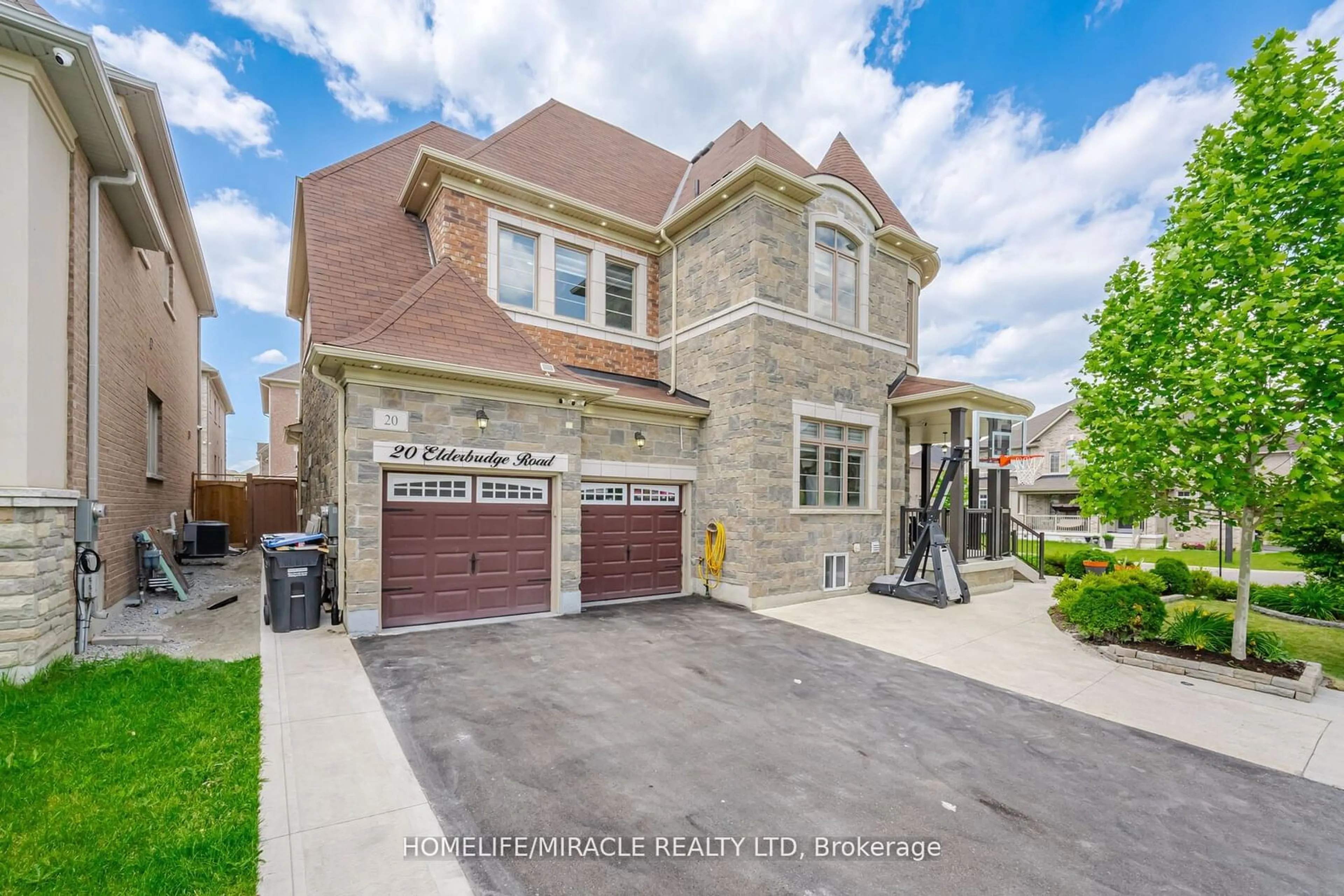 Home with brick exterior material, street for 20 Elderbridge Rd, Brampton Ontario L6P 4G5